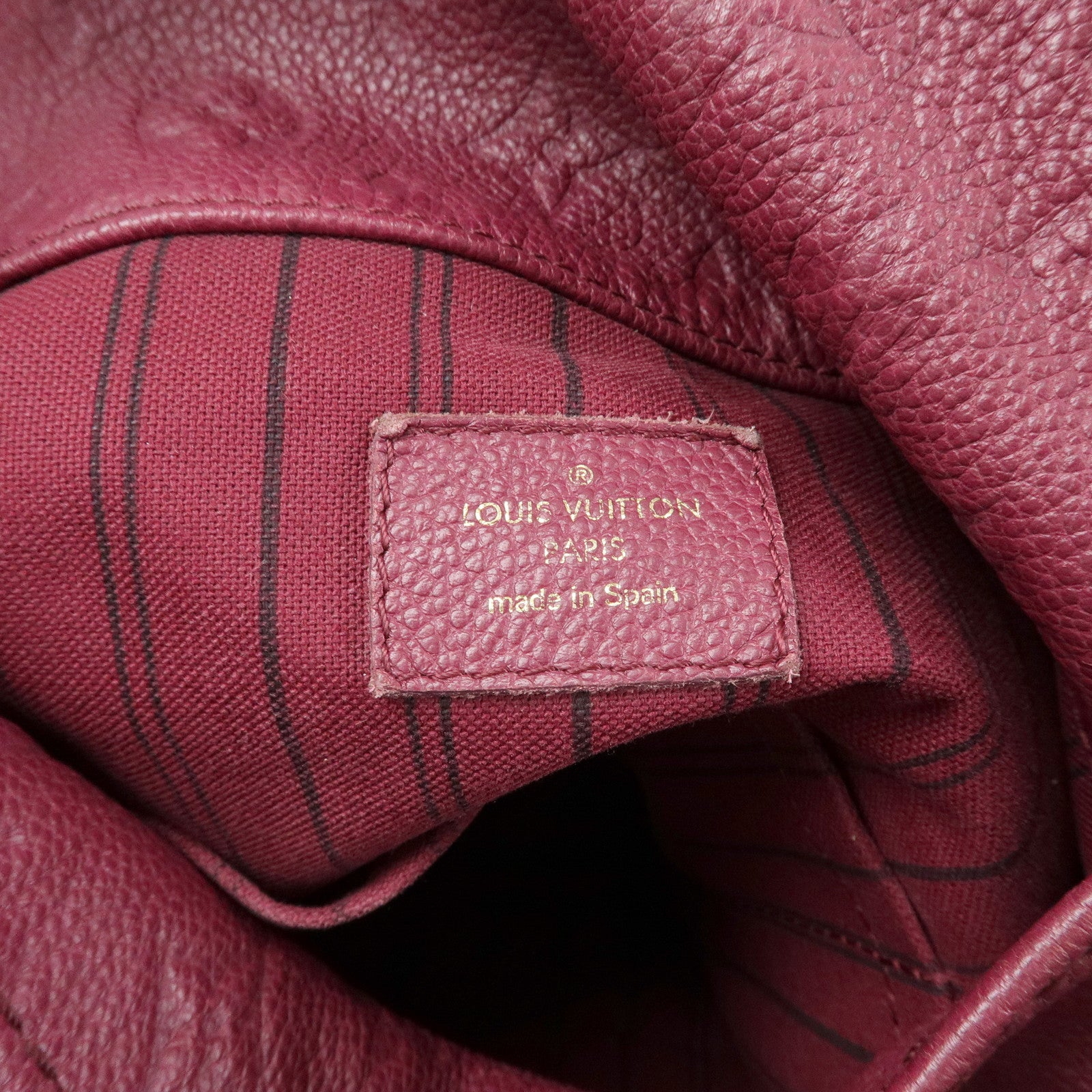 Louis Vuitton Monogram Empreinte Empreinte Leather MM Aurore M94047