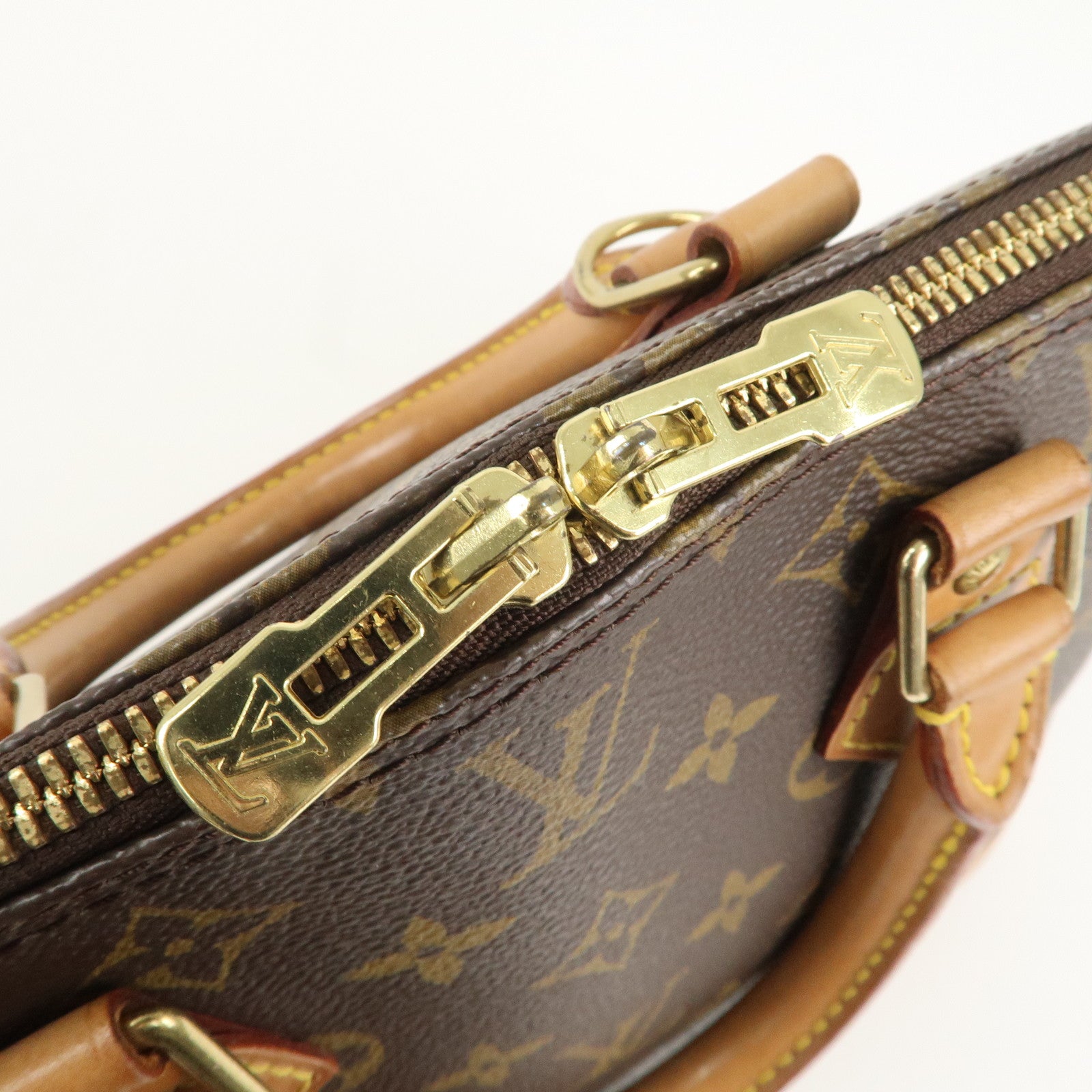 Louis Vuitton Monogram Alma Hand Bag Brown M51130