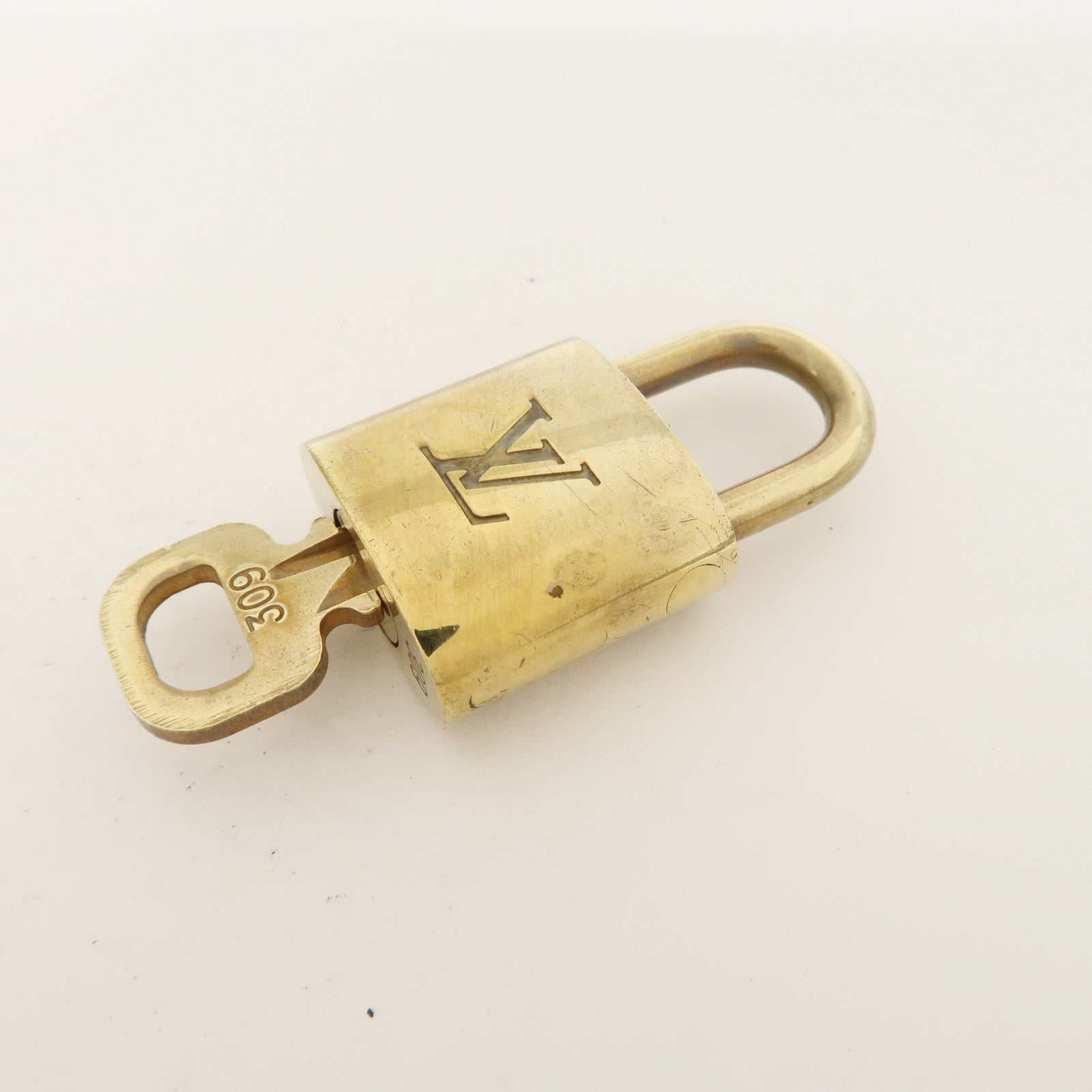 Louis Vuitton Set of 10 Lock & Key Cadena Key Lock Metal Gold