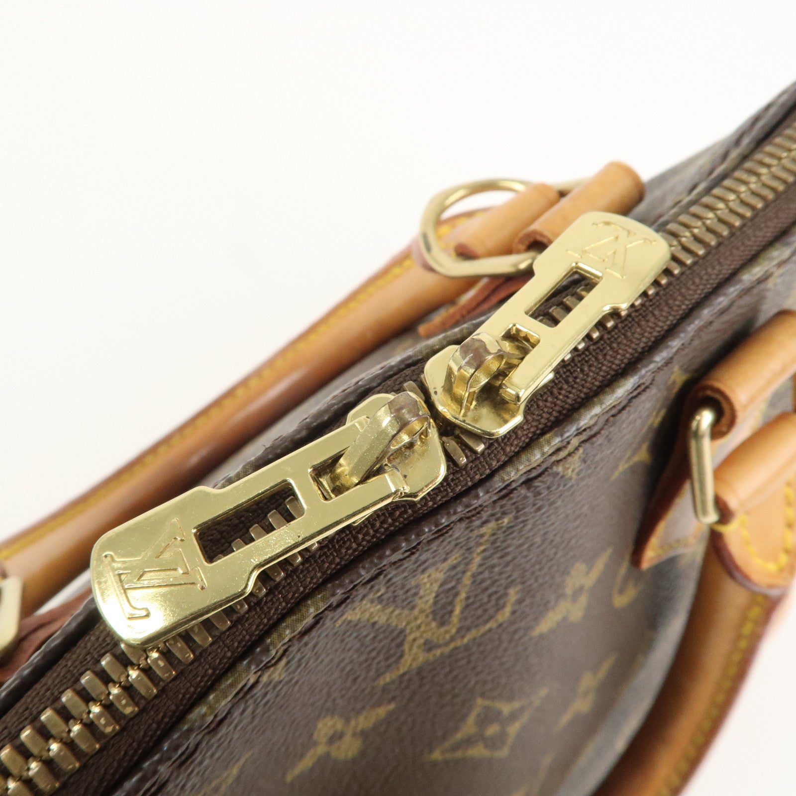 Louis Vuitton Monogram Alma Hand Bag Brown M51130