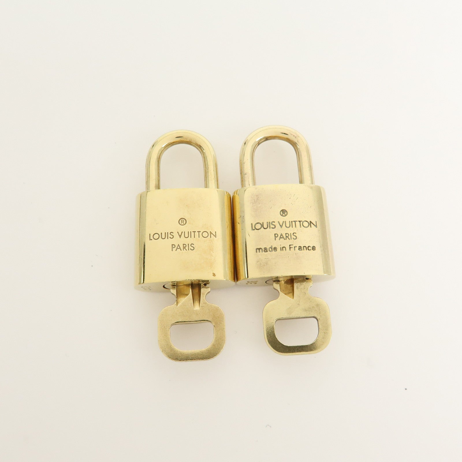 Louis Vuitton Set of 10 Lock & Key Cadena Key Lock Gold
