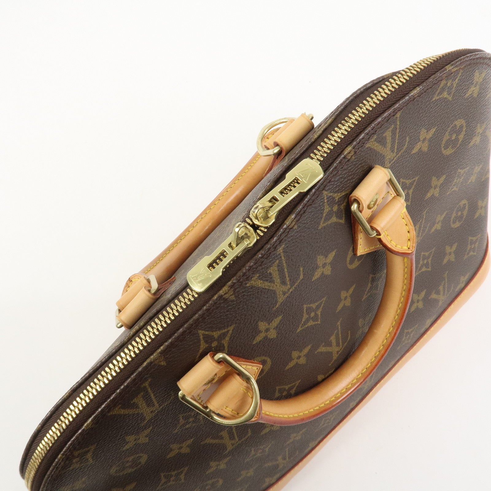 Louis Vuitton Monogram Alma Hand Bag Brown M51130