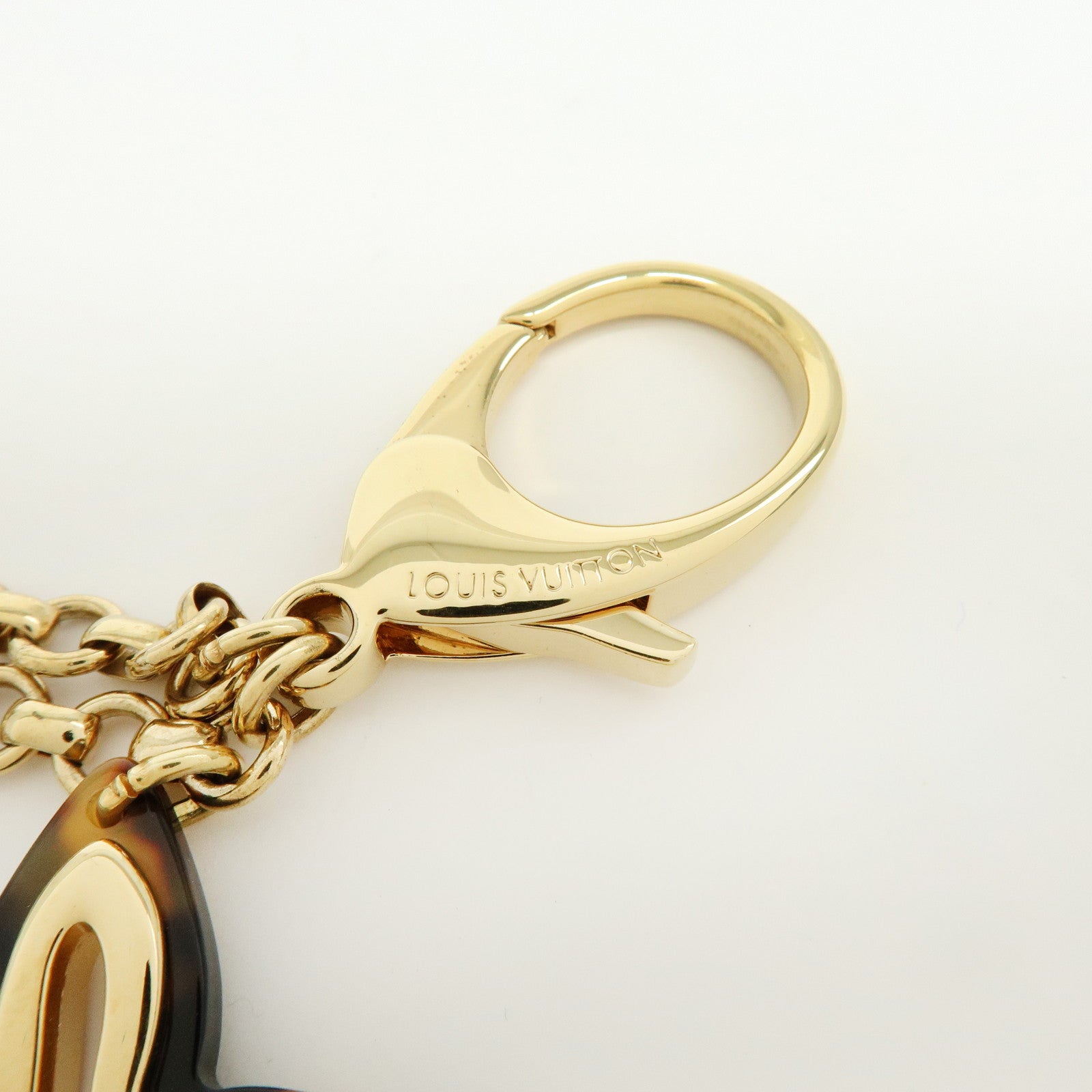 Louis Vuitton Bijou Sac Insolence Bag Charm Gold Brown M65087