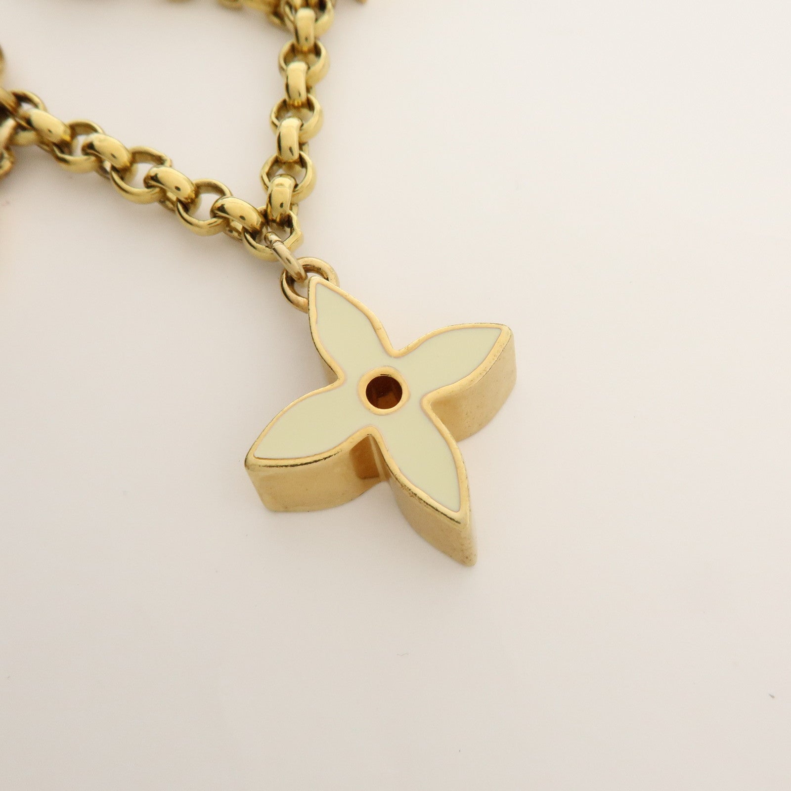 Louis Vuitton Fleur de Monogram Bag Charm Key Chain Gold M65111