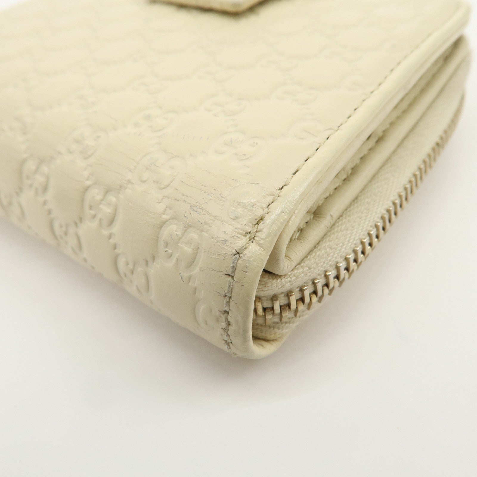 GUCCI Micro Guccissima Signature Bi-Fold Compact Wallet 449395