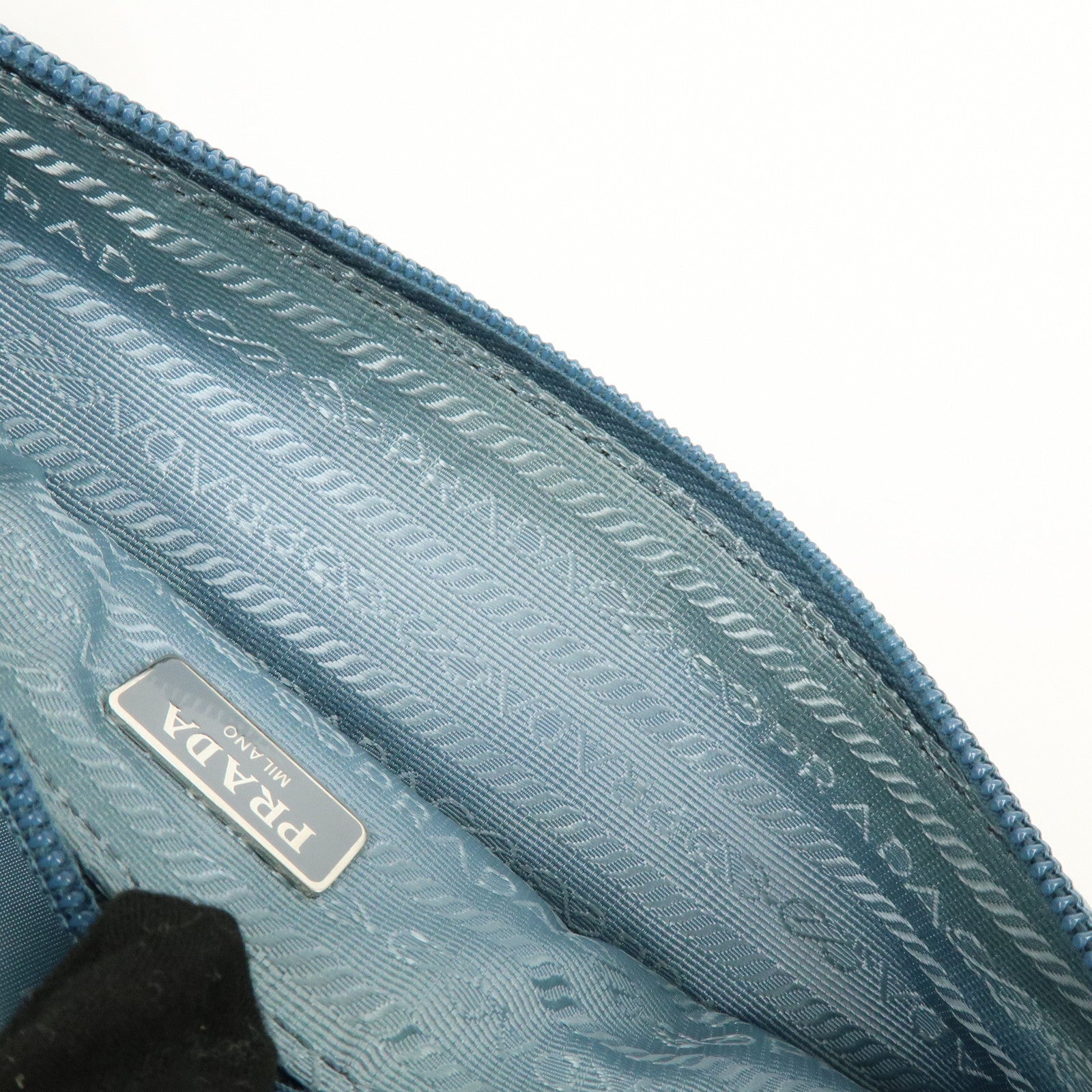 PRADA Triangle Logo TESSUTO IMPUNTU Nylon Pouch Light Blue 1NH545