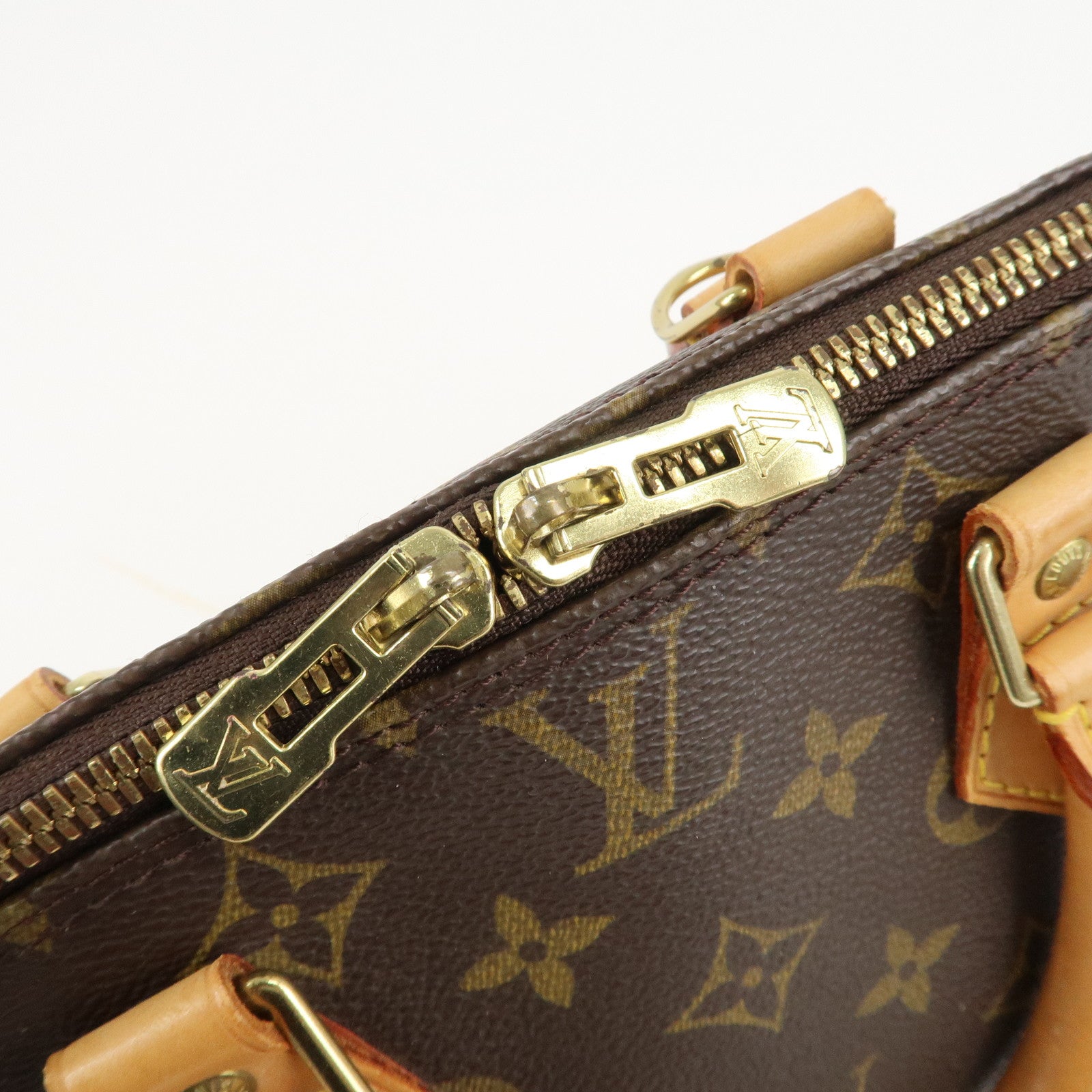 Louis Vuitton Monogram Alma Hand Bag Brown M51130