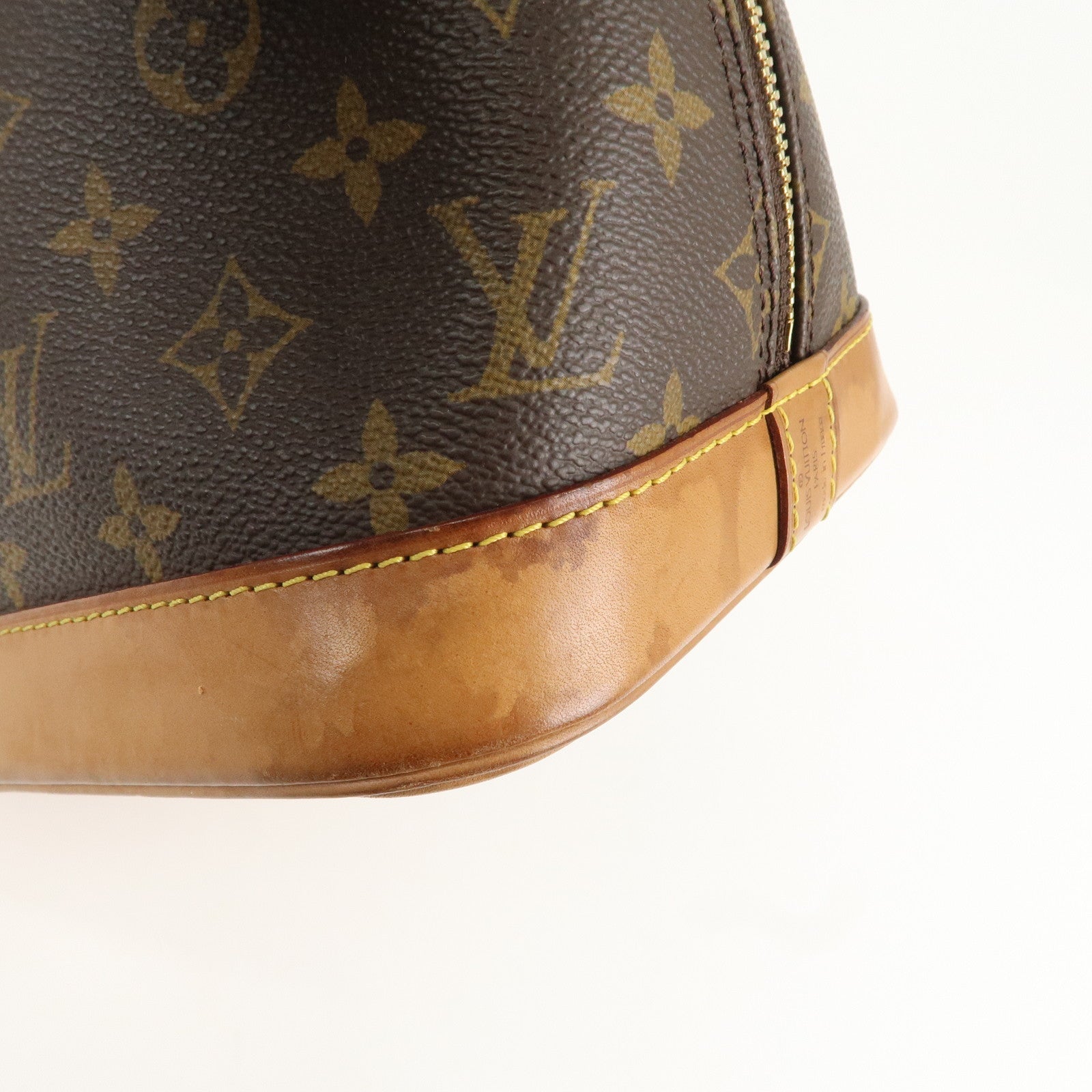 Louis Vuitton Monogram Alma Hand Bag Brown M51130