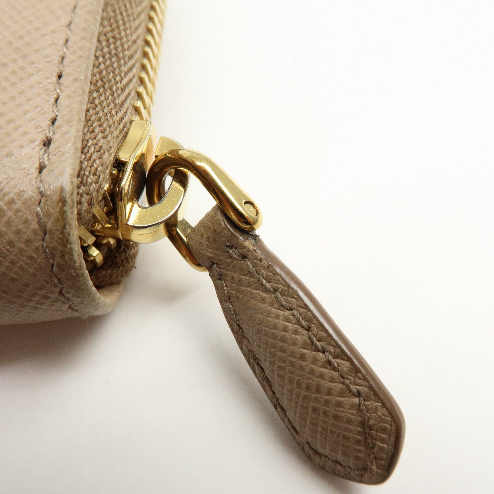 PRADA Triangle Logo Saffiano Leather Round Zippy Compact Wallet