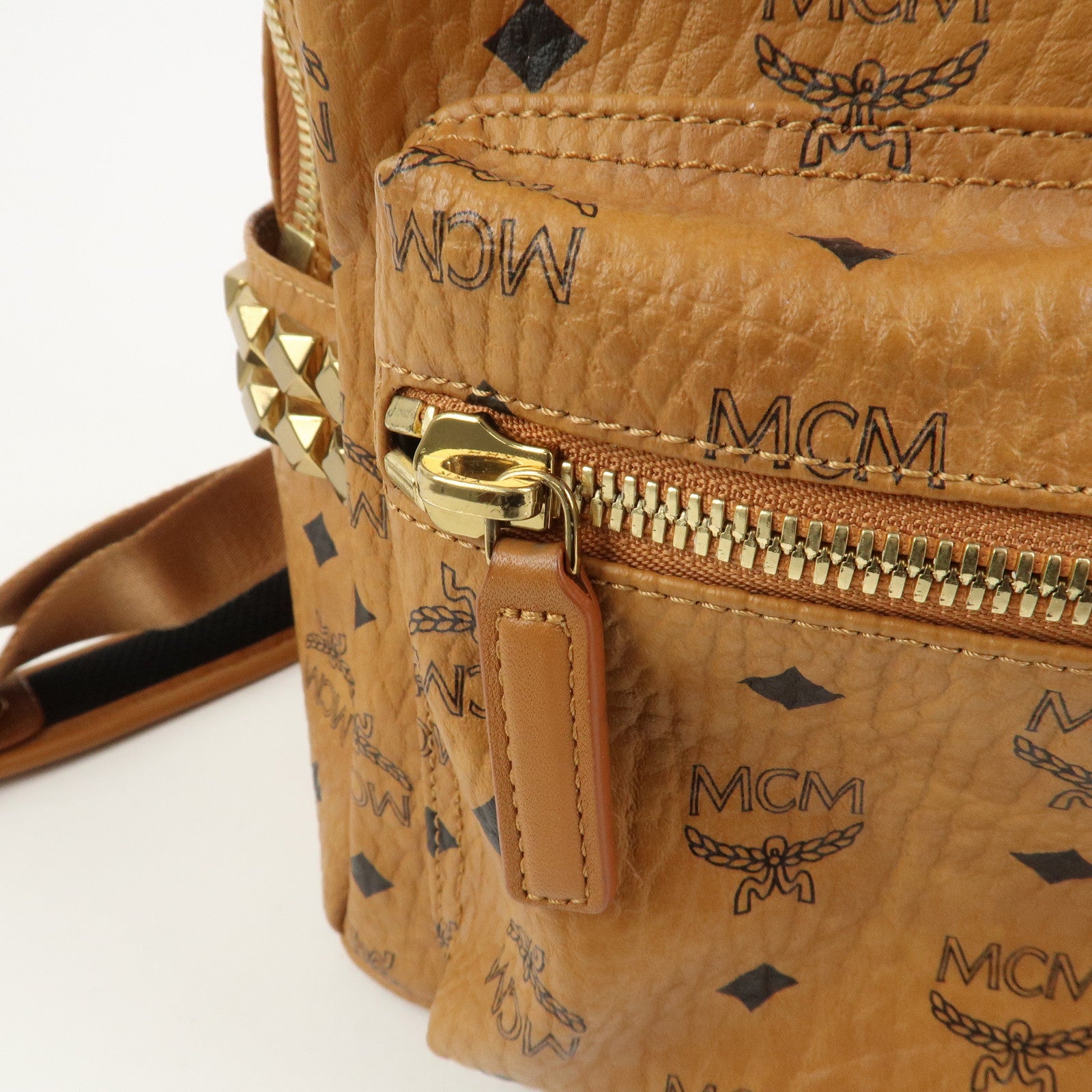 MCM Visetos PVC Leather Backpack Rucksack Studs Cognac