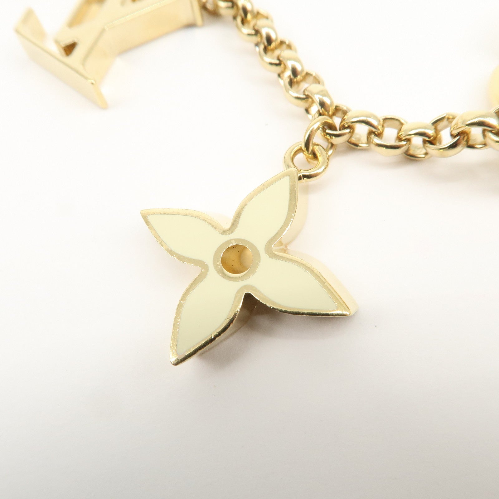 Louis Vuitton Fleur de Monogram Bag Charm Key Chain Gold M65111