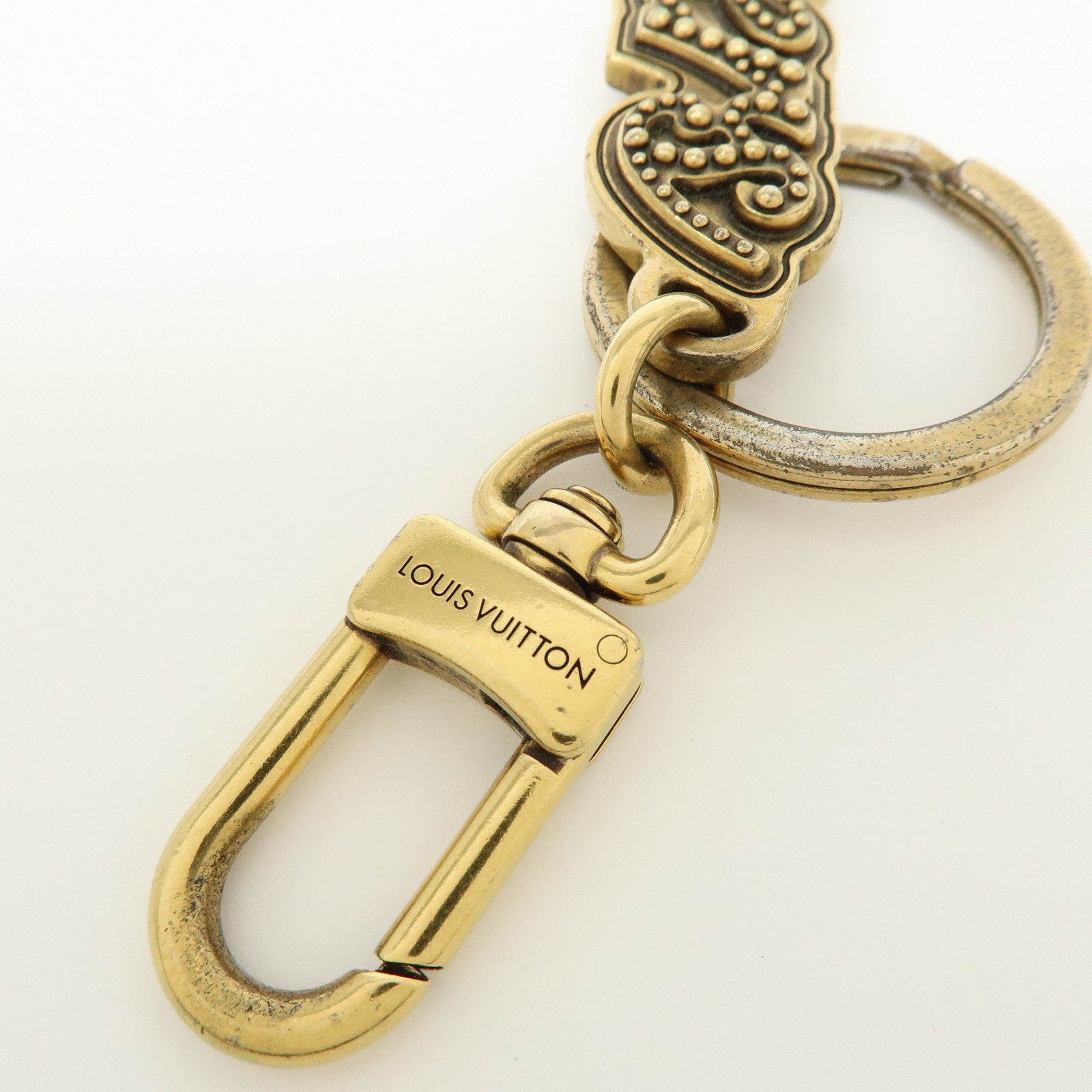 Louis Vuitton LV Lovers Studs Metal Bag Charm Key Chain Gold M01755