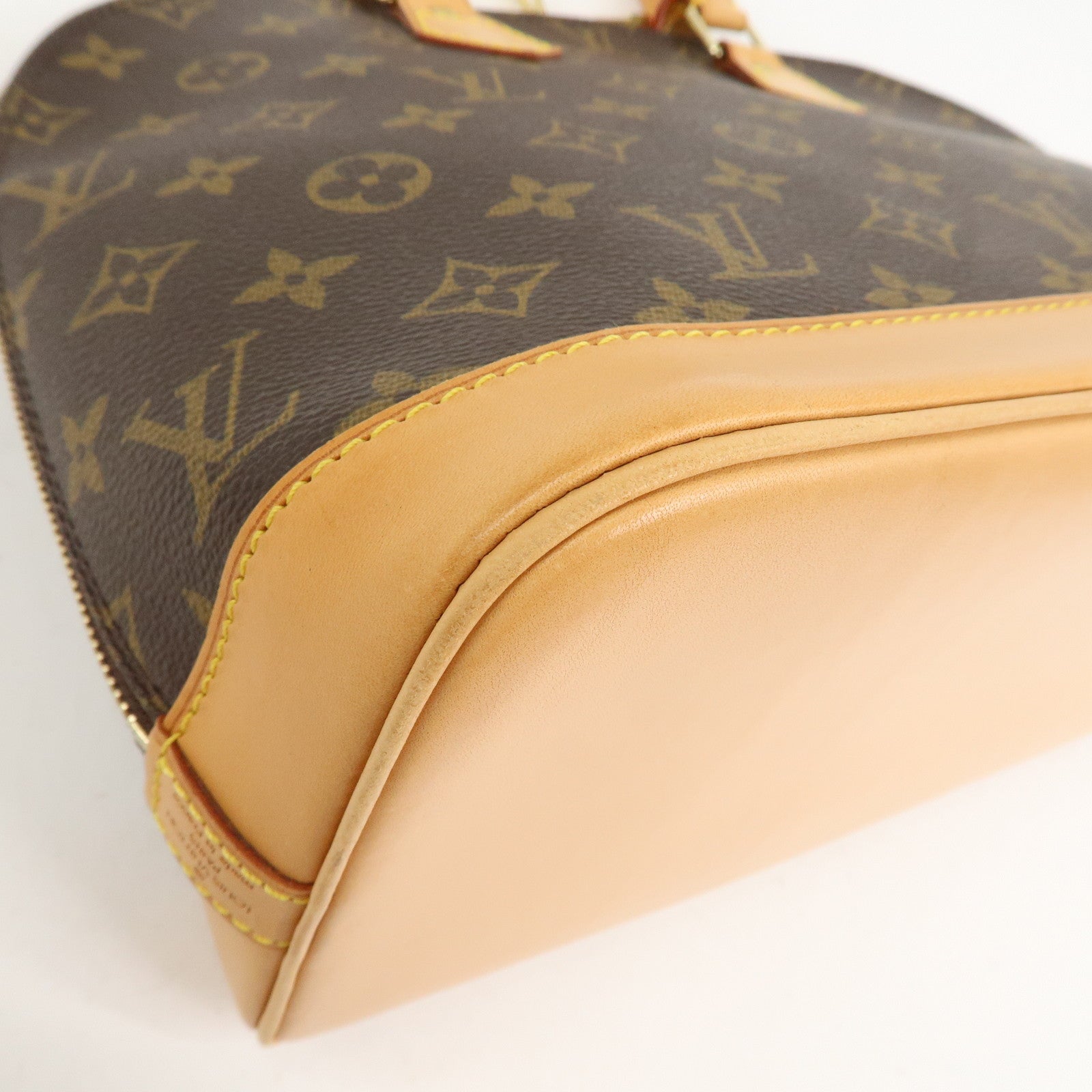 Louis Vuitton Monogram Alma Hand Bag Brown M51130