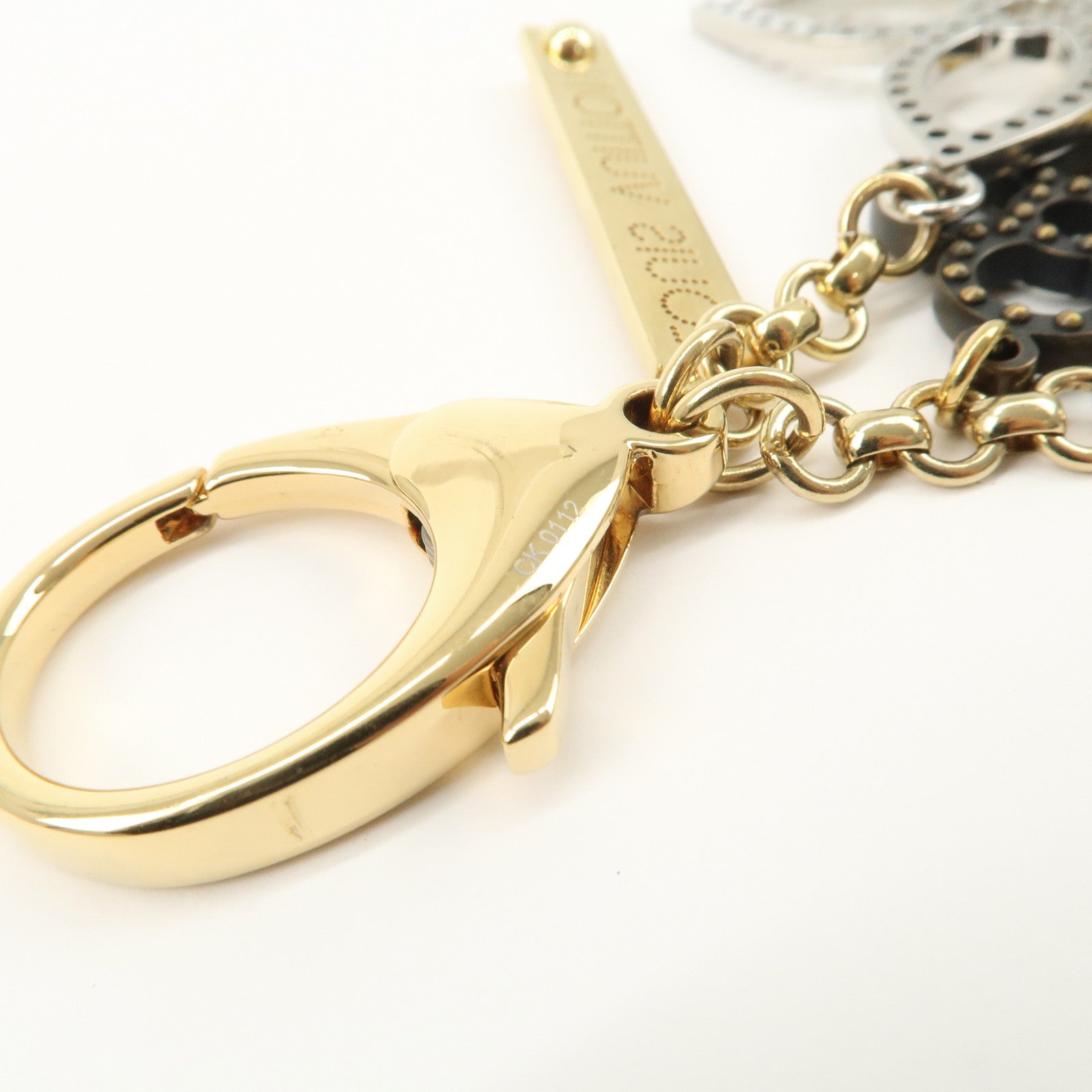 Louis Vuitton Monogram Bijoux Sac Tapage Bag Charm Gold M66350