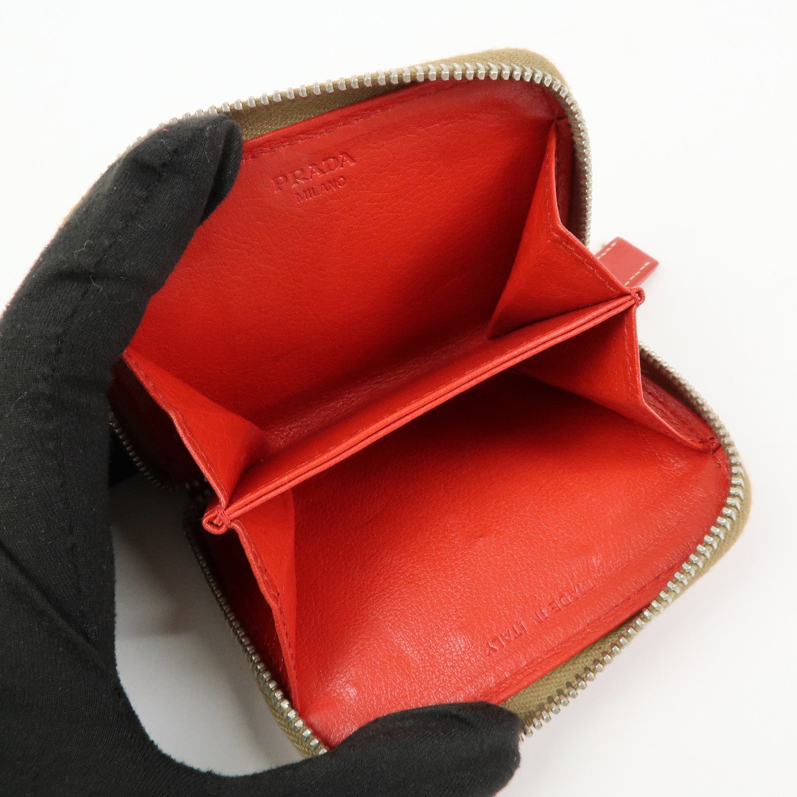 PRADA Triangle Logo Punched Leather Round Zippy Coin Case Red
