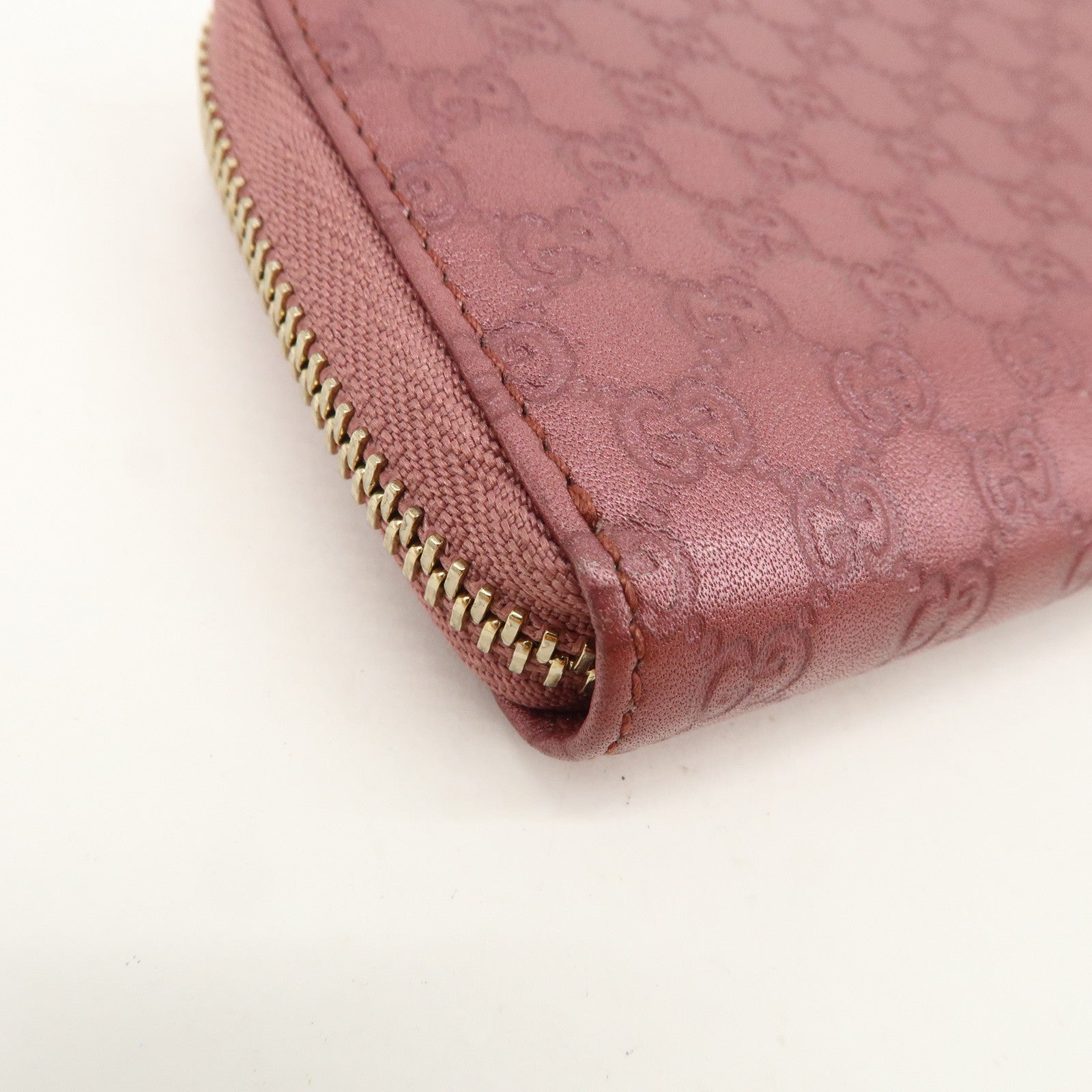 GUCCI Micro Guccissima Leather Round Zippy Coin Case 255452