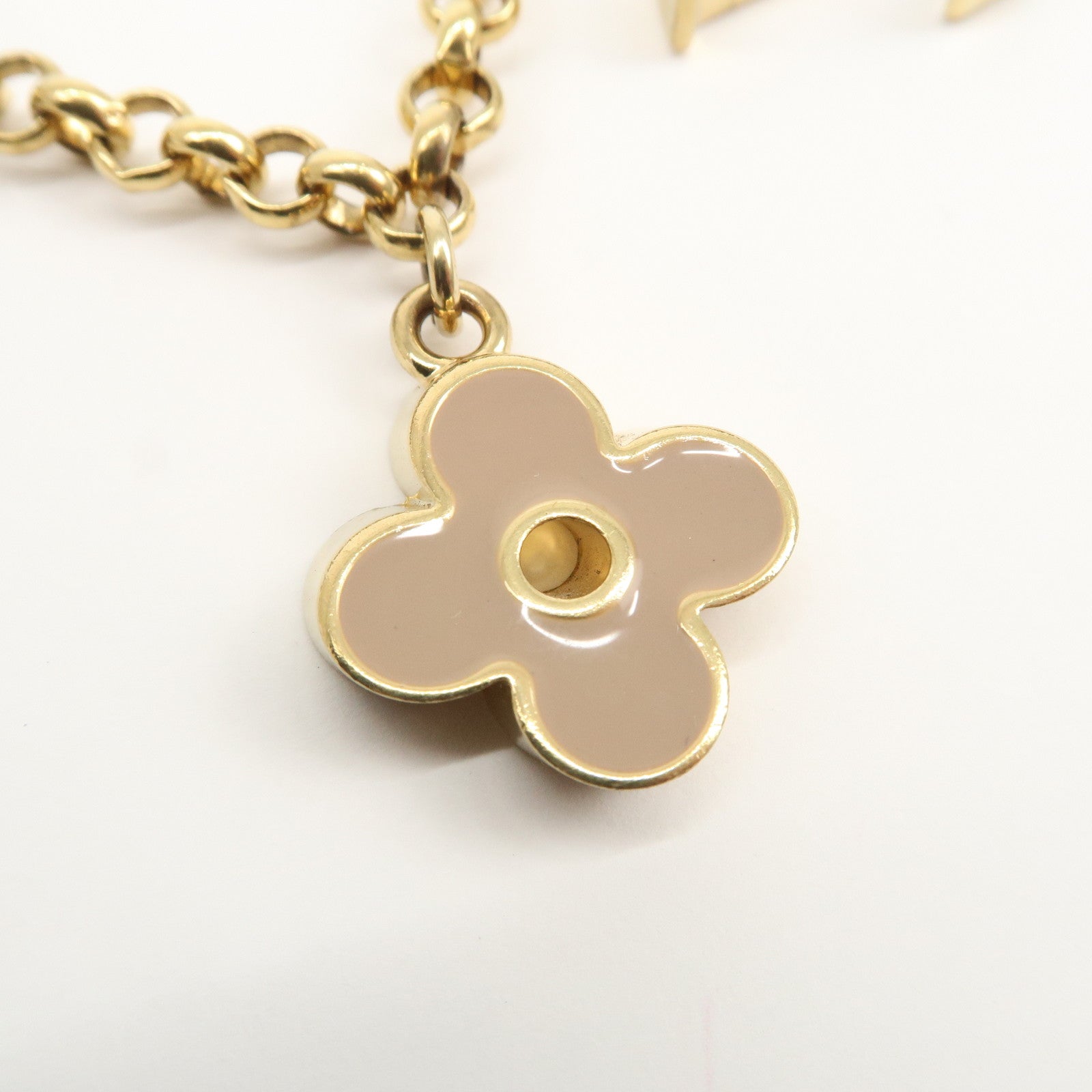 Louis Vuitton Fleur de Monogram Bag Charm Key Chain Gold M65111