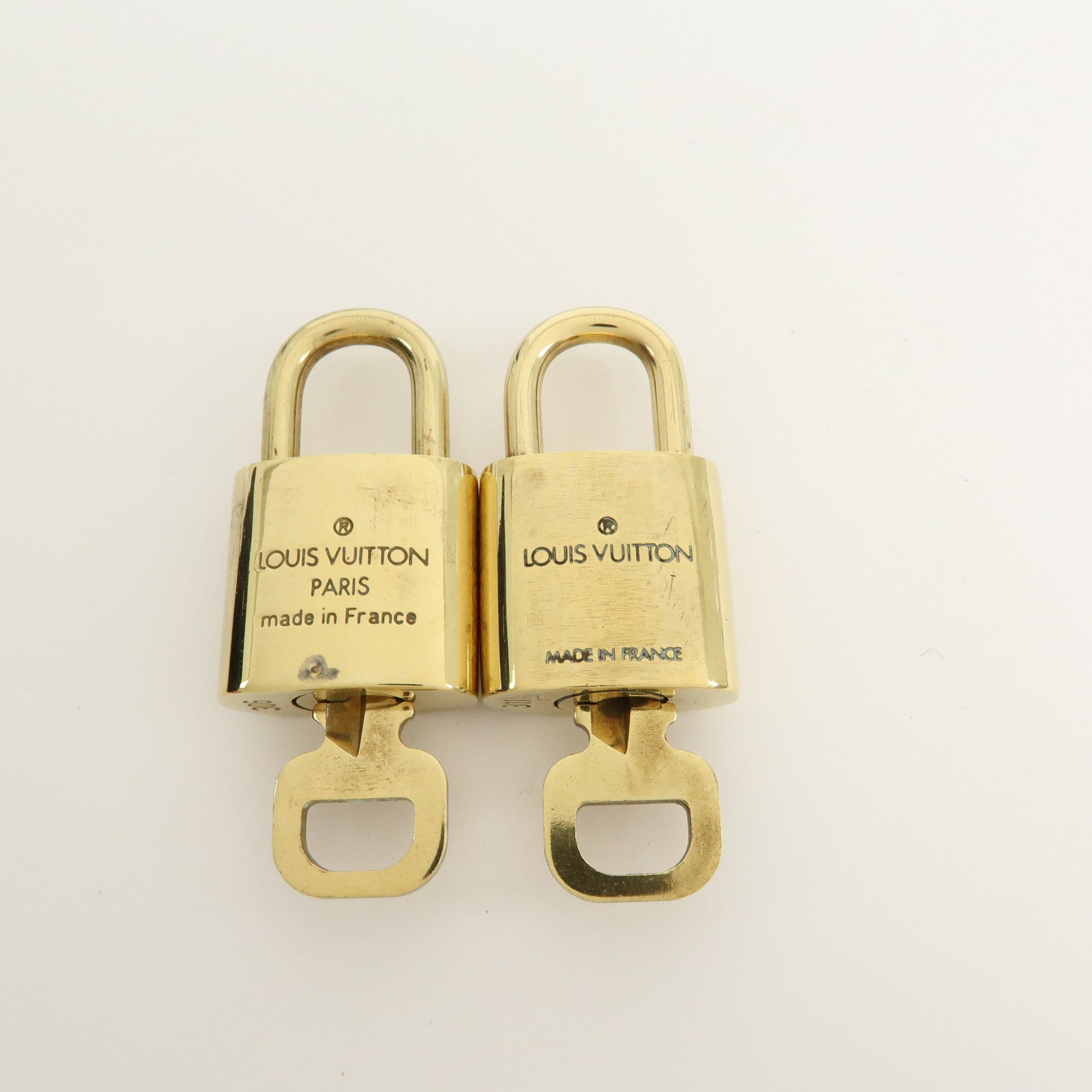 Louis Vuitton Set of 10 Lock & Key Cadena Key Lock Gold