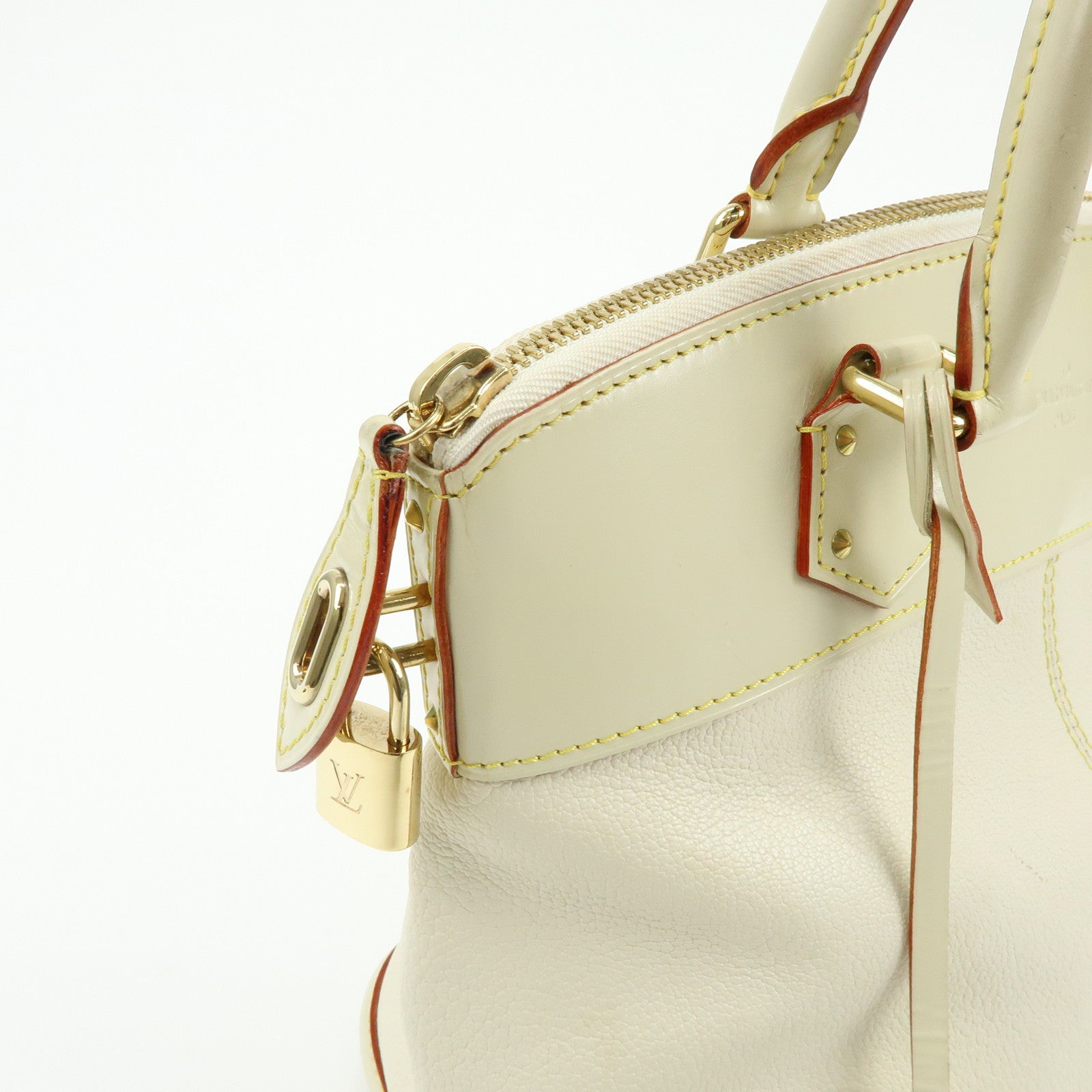 Louis Vuitton Suhari Lock It PM Hand Bag Blanc M91887
