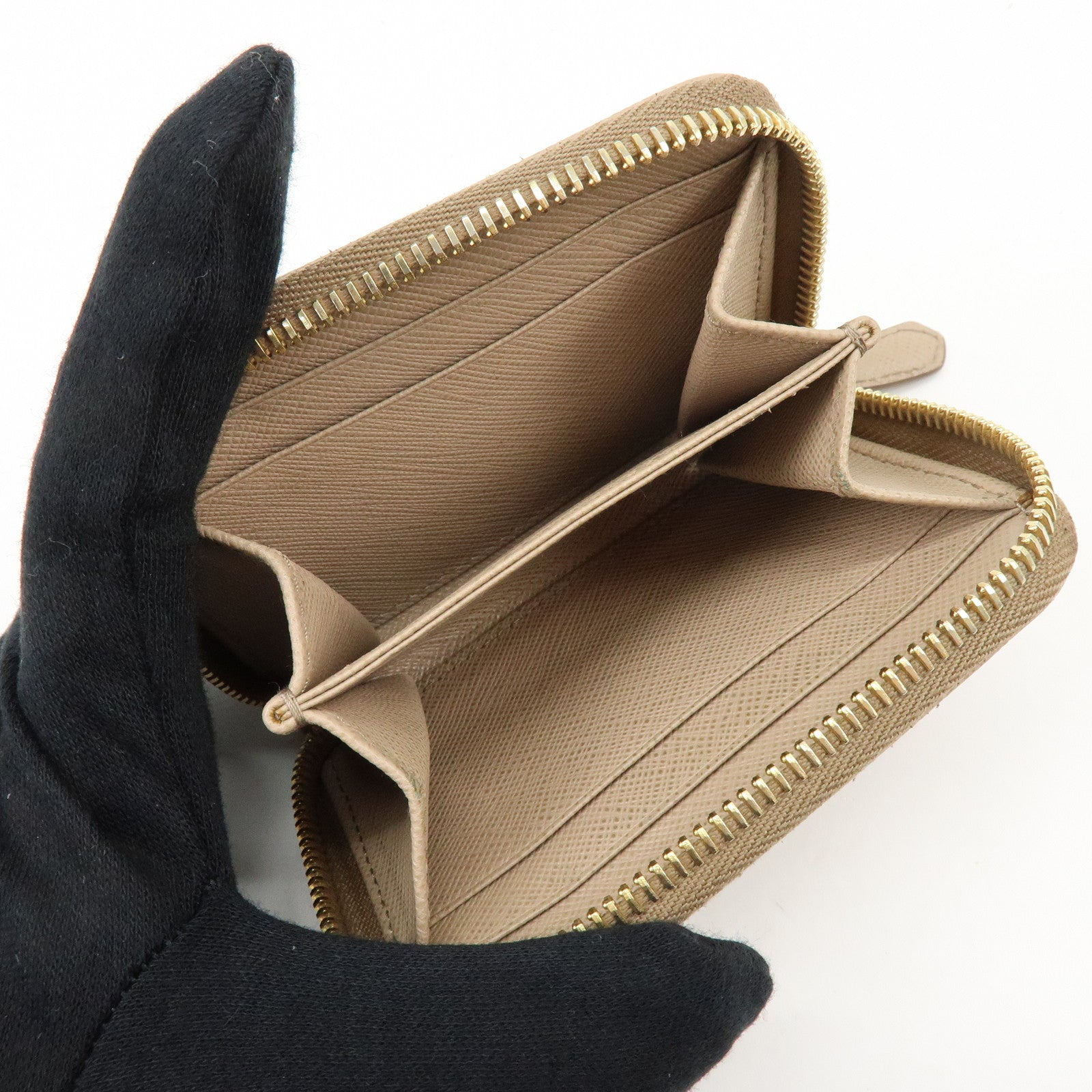 PRADA Triangle Logo Saffiano Leather Round Zippy Compact Wallet