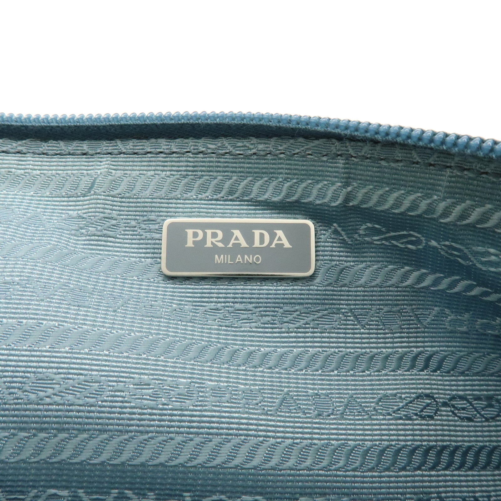 PRADA Triangle Logo TESSUTO IMPUNTU Nylon Pouch Light Blue 1NH545