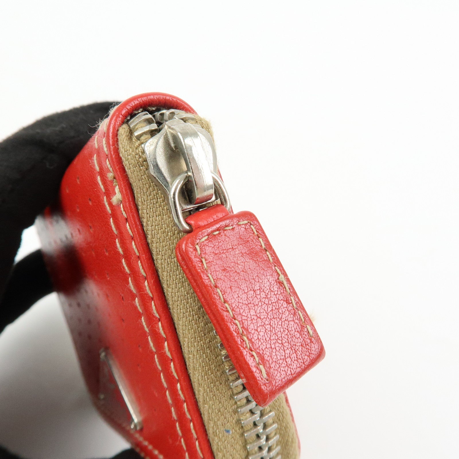 PRADA Triangle Logo Punched Leather Round Zippy Coin Case Red