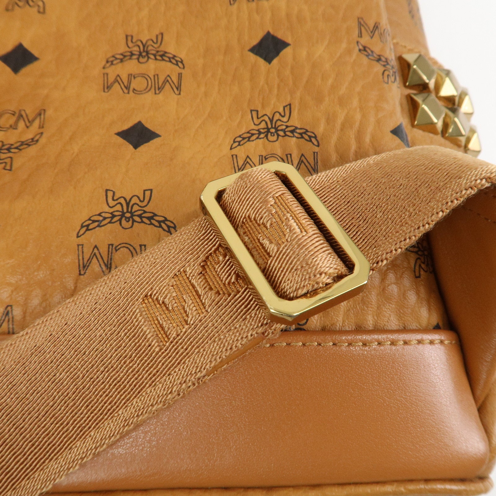 MCM Visetos PVC Leather Backpack Rucksack Studs Cognac