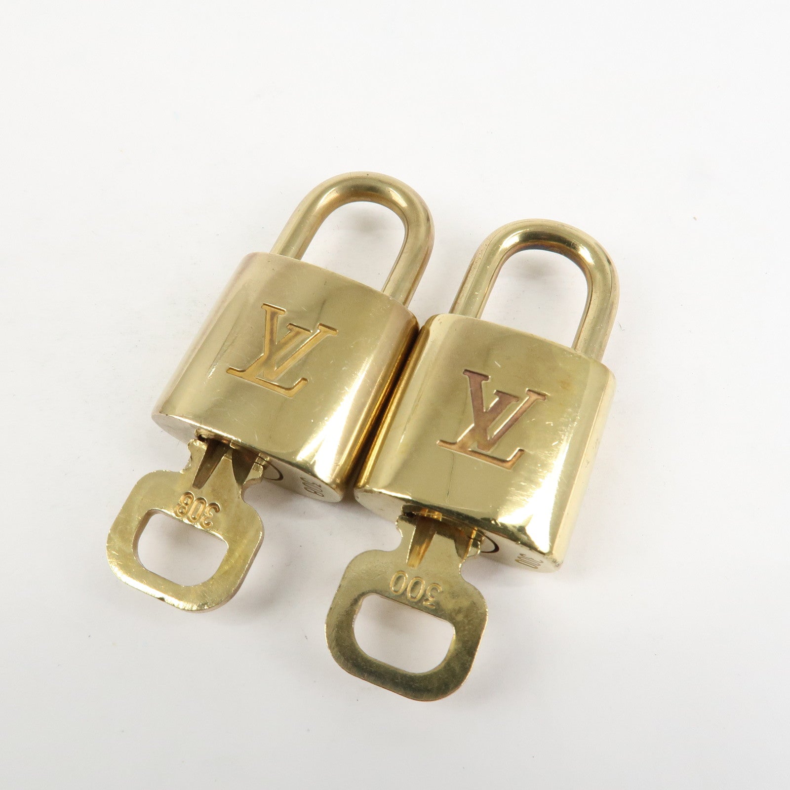 Louis Vuitton Set of 10 Lock & Key Cadena Key Lock Metal Gold