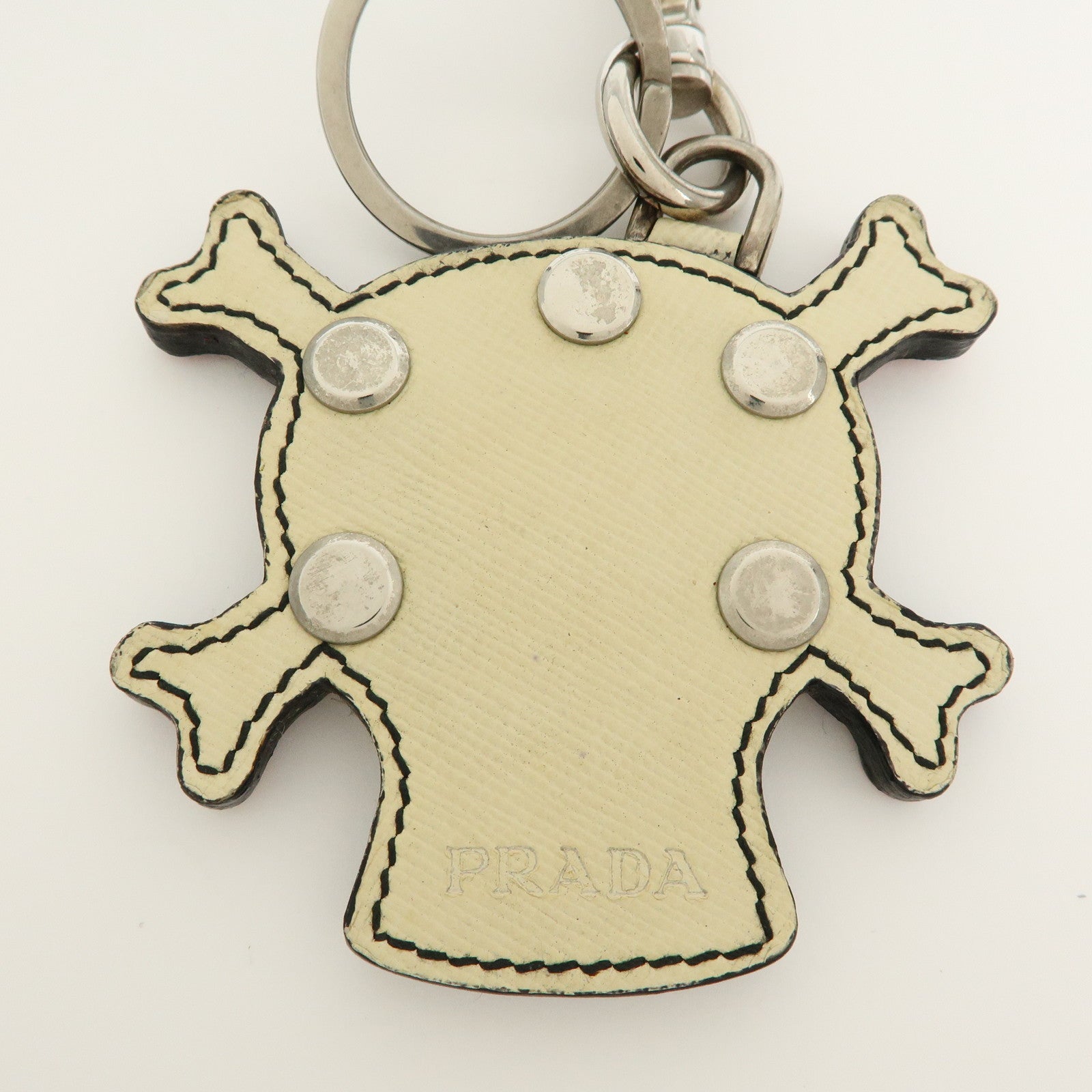 PRADA Saffiano Leather Metal Skull Bag Key Charm Key Holder Ivory
