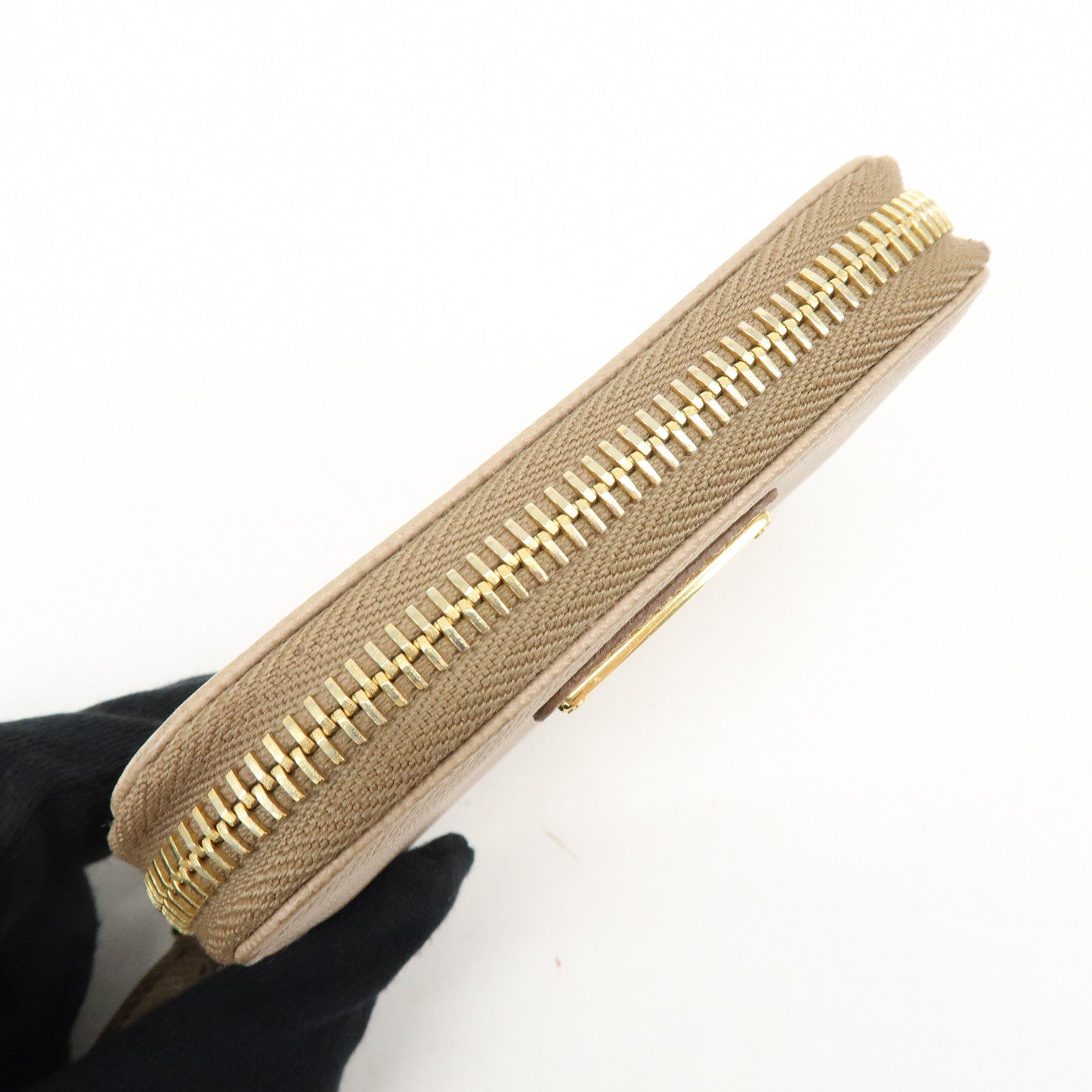 PRADA Triangle Logo Saffiano Leather Round Zippy Compact Wallet