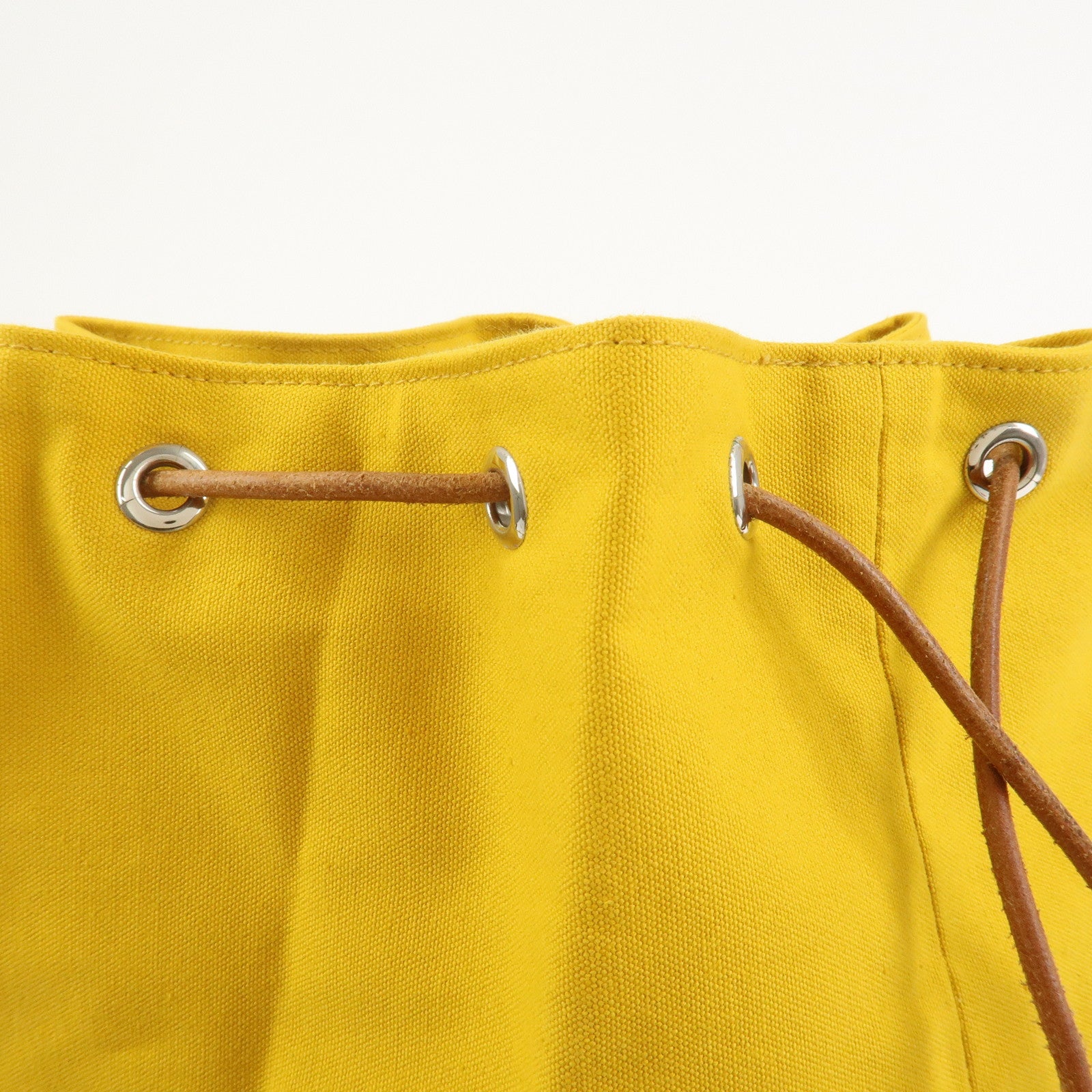 HERMES Porochon Mimil GM Canvas Leather Drawstring Backpack Yellow