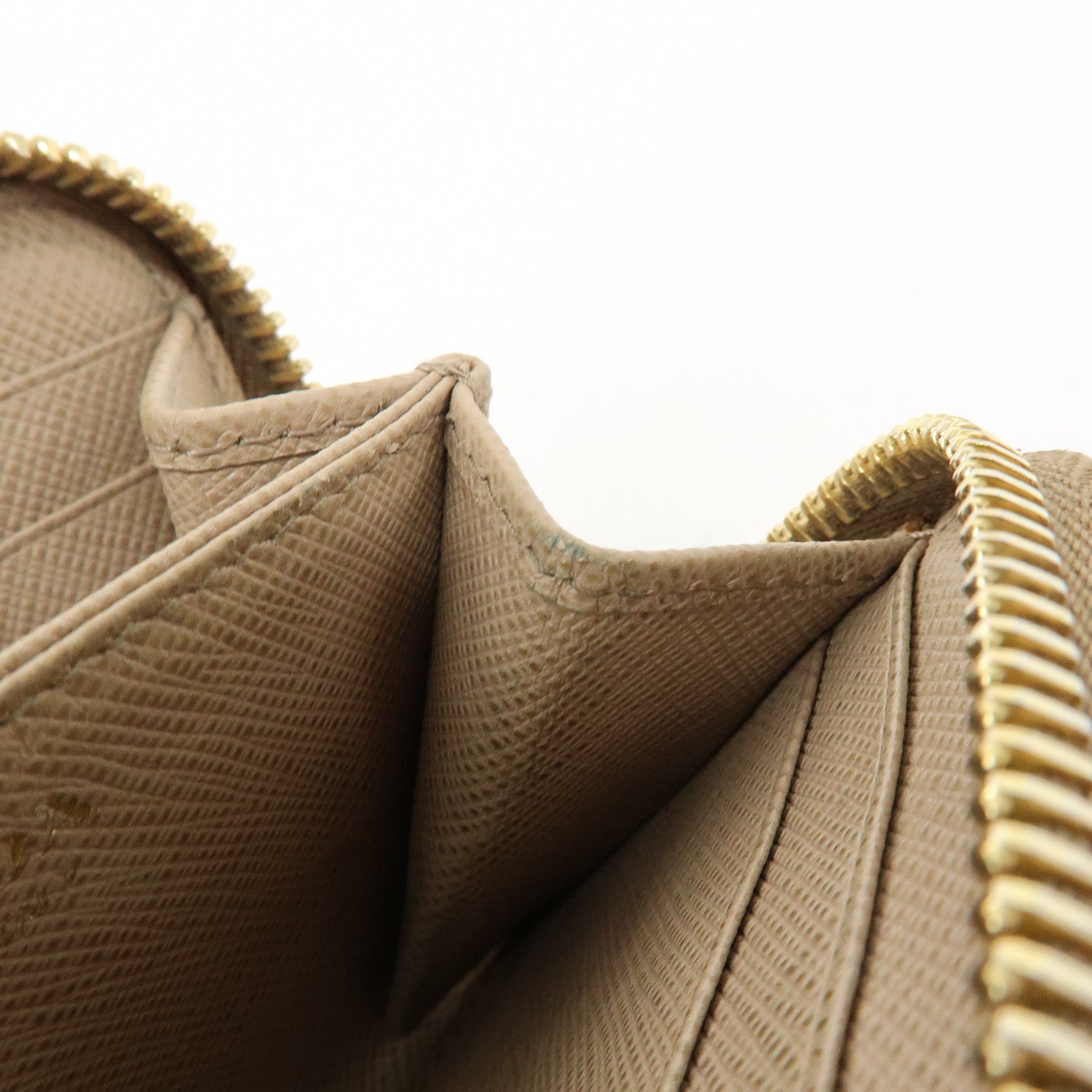 PRADA Triangle Logo Saffiano Leather Round Zippy Compact Wallet