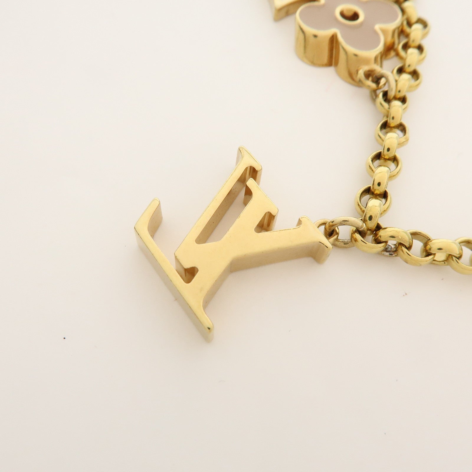Louis Vuitton Fleur de Monogram Bag Charm Key Chain Gold M65111