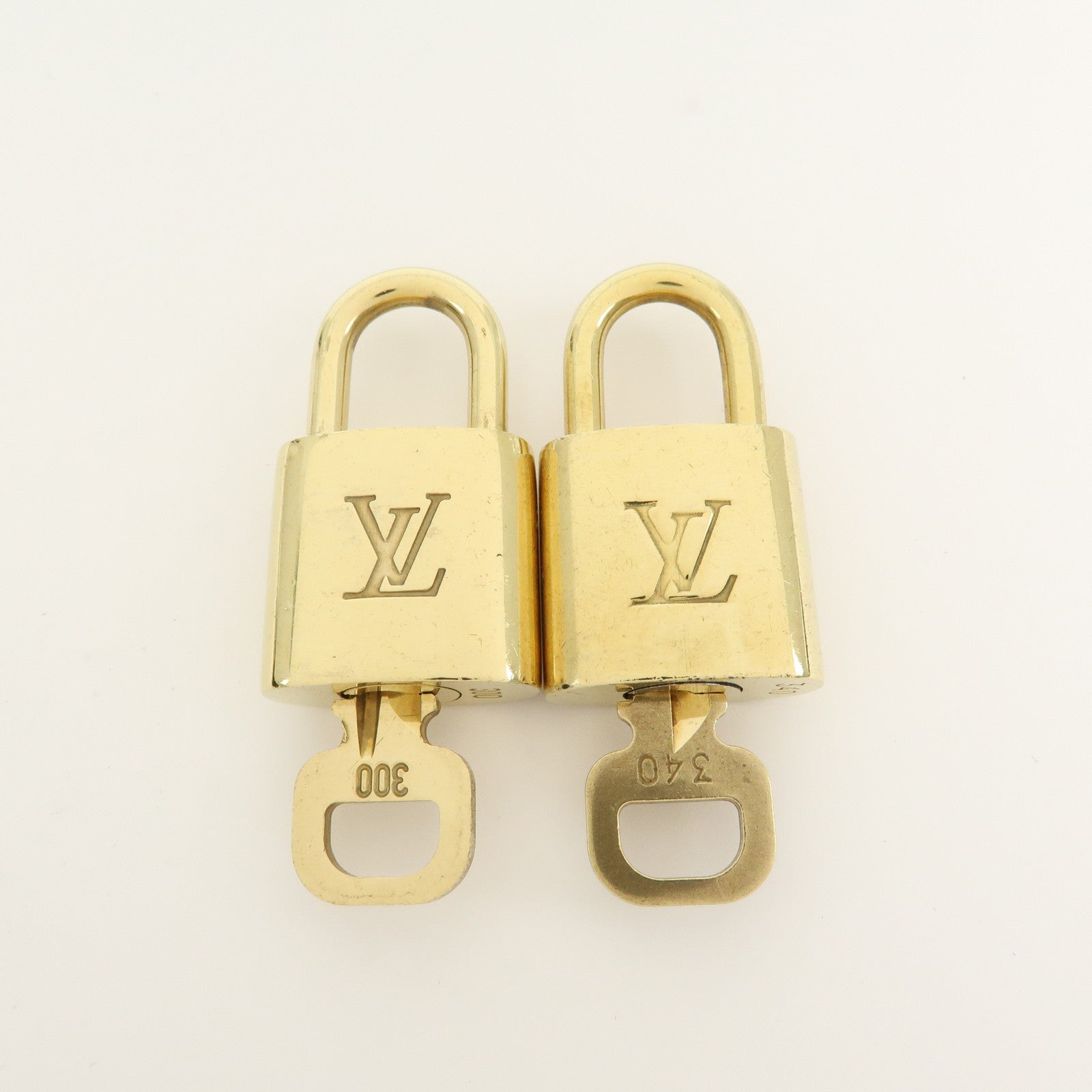 Louis Vuitton Set of 10 Lock & Key Cadena Key Lock Gold