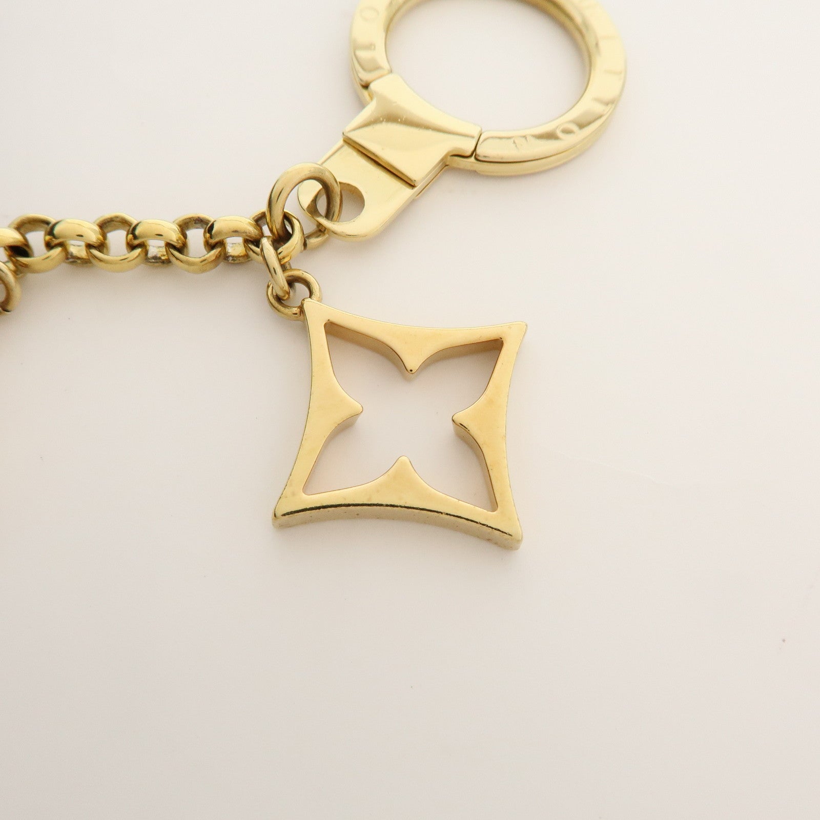 Louis Vuitton Fleur de Monogram Bag Charm Key Chain Gold M65111