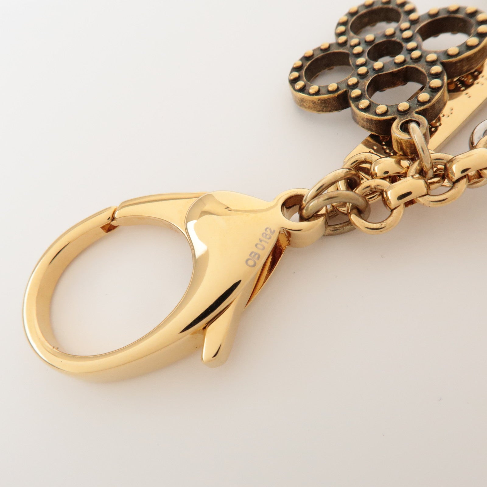 Louis Vuitton Bijoux Sac Tabage Bag Charm Gold Silver M65722