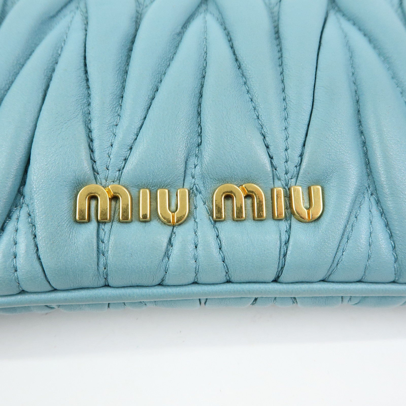 MIU MIU Logo Matelasse Nappa Leather Clutch Bag Light Blue 5N1573