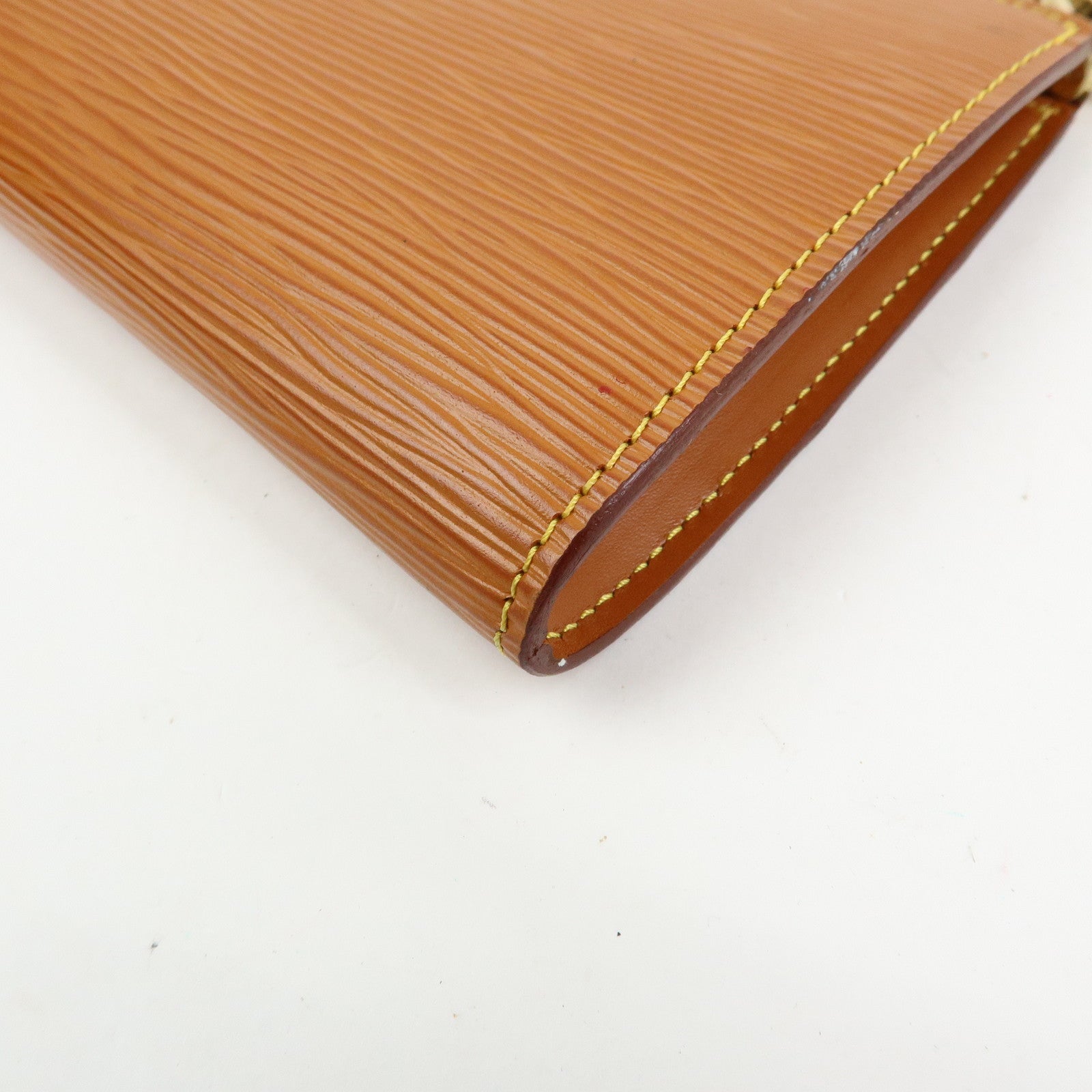 Louis Vuitton Epi Pochette Accessoires Pouch Zipang Gold M52948