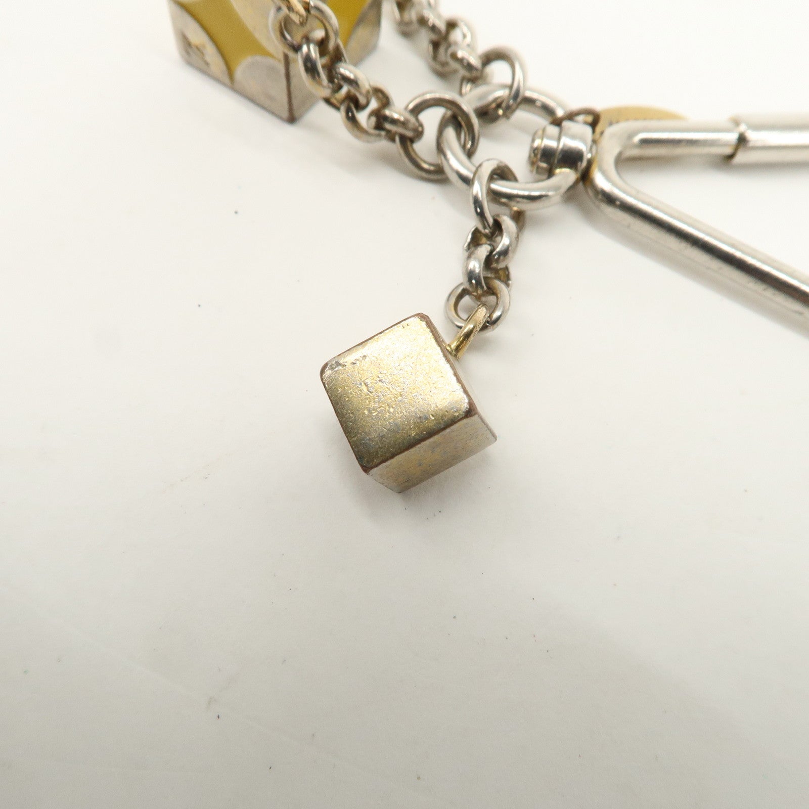 Louis Vuitton Metal Cube Bag Charm Key Charm Silver M65118