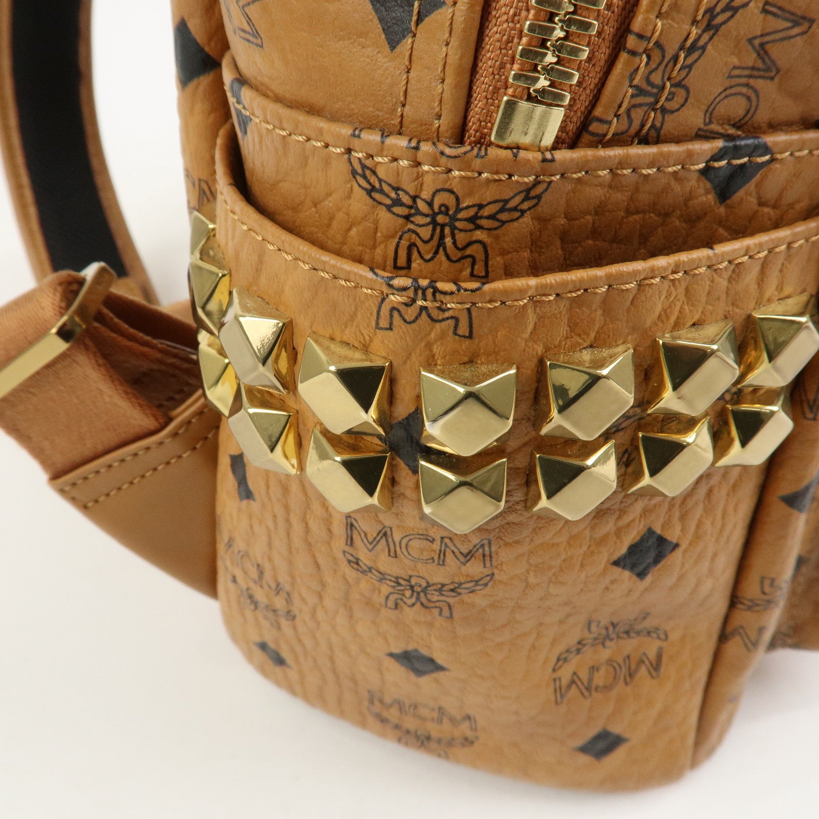MCM Visetos PVC Leather Backpack Rucksack Studs Cognac