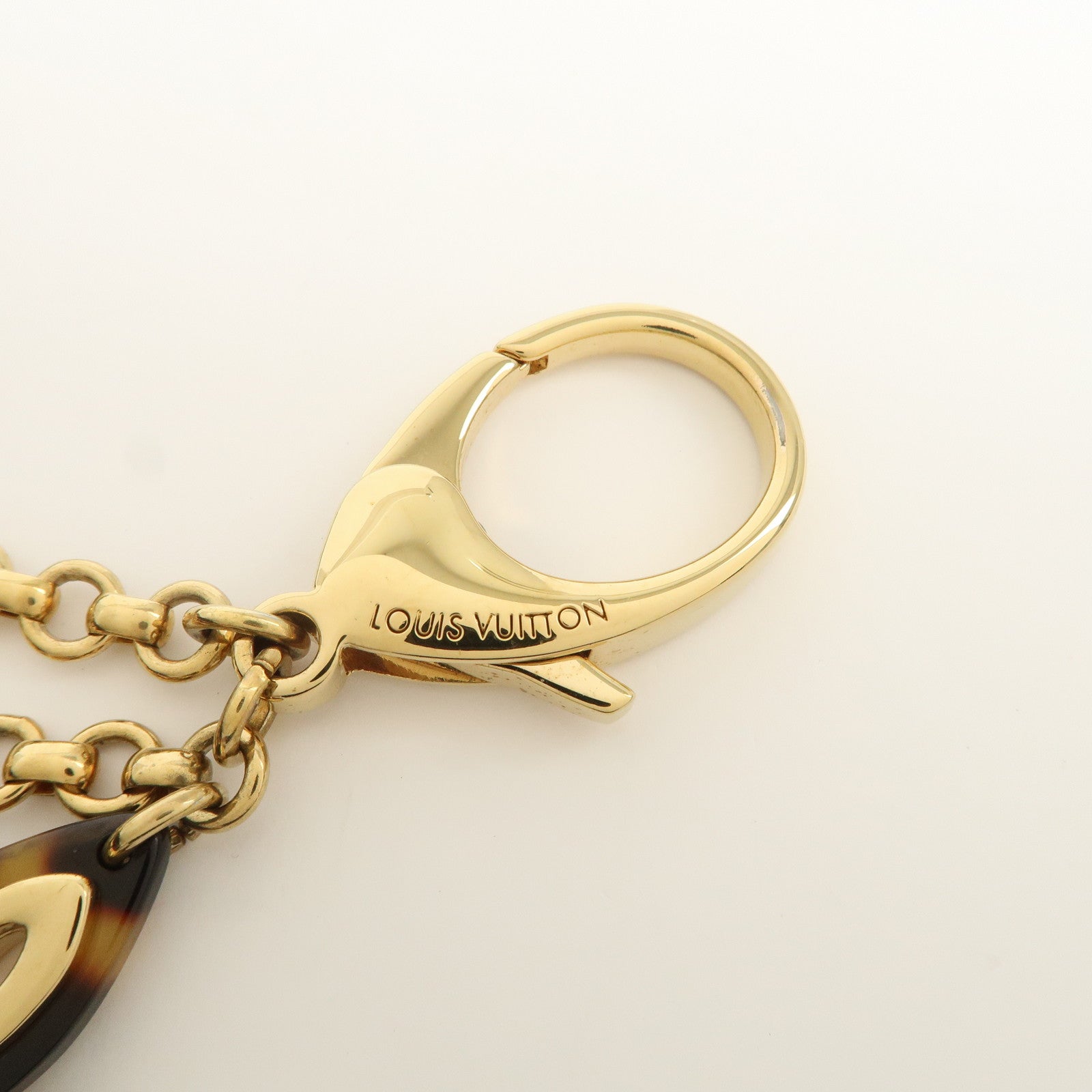 Louis Vuitton Bijou Sac Insolence Bag Charm Gold Brown M65844