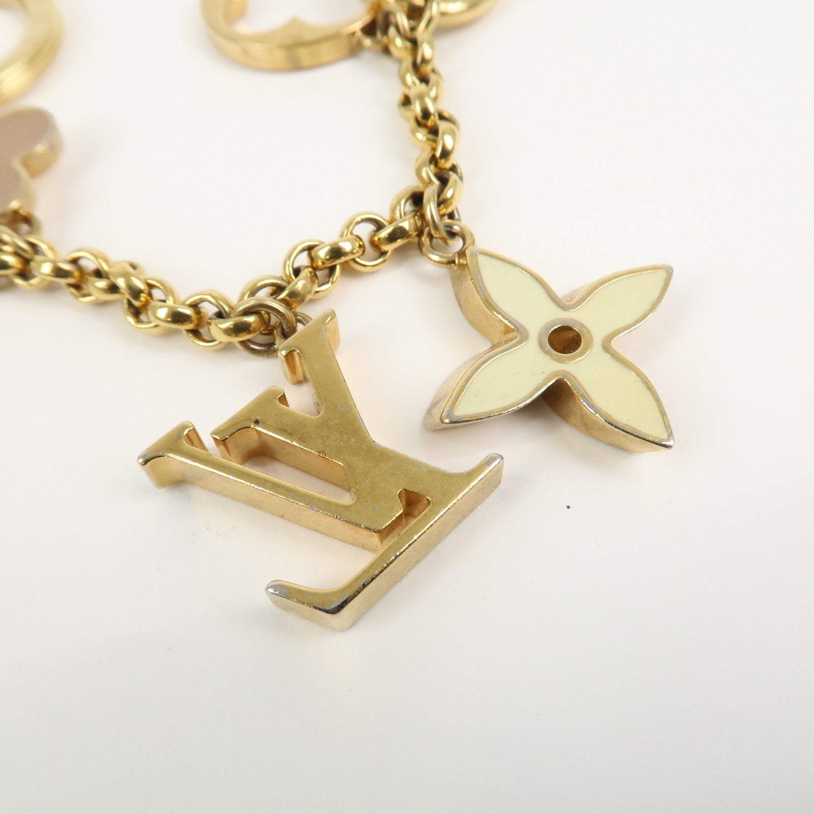 Louis Vuitton Fleur de Monogram Bag Charm Key Chain Gold M65111