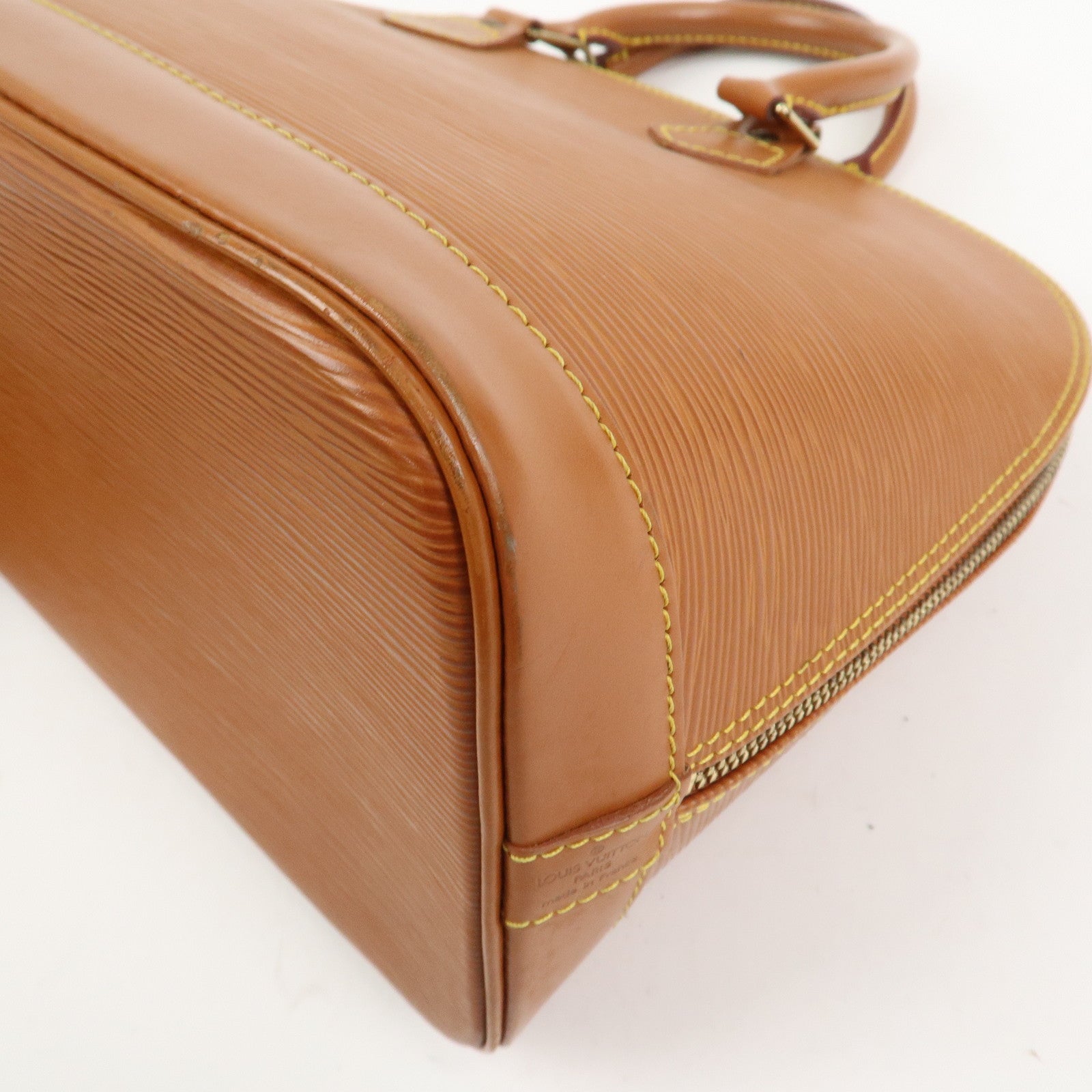 Louis Vuitton Epi Alma Hand Bag Zipang Gold M54148