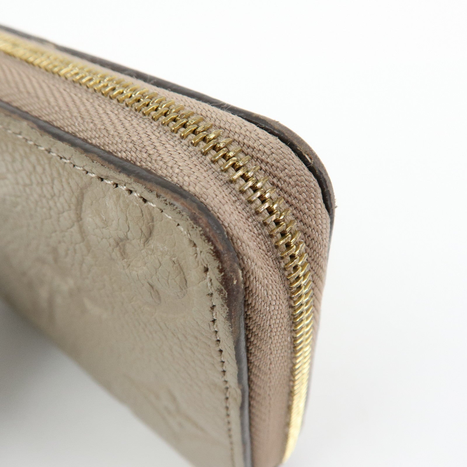Louis Vuitton Monogram Empreinte Round Zippy Coin Case Beige M68696
