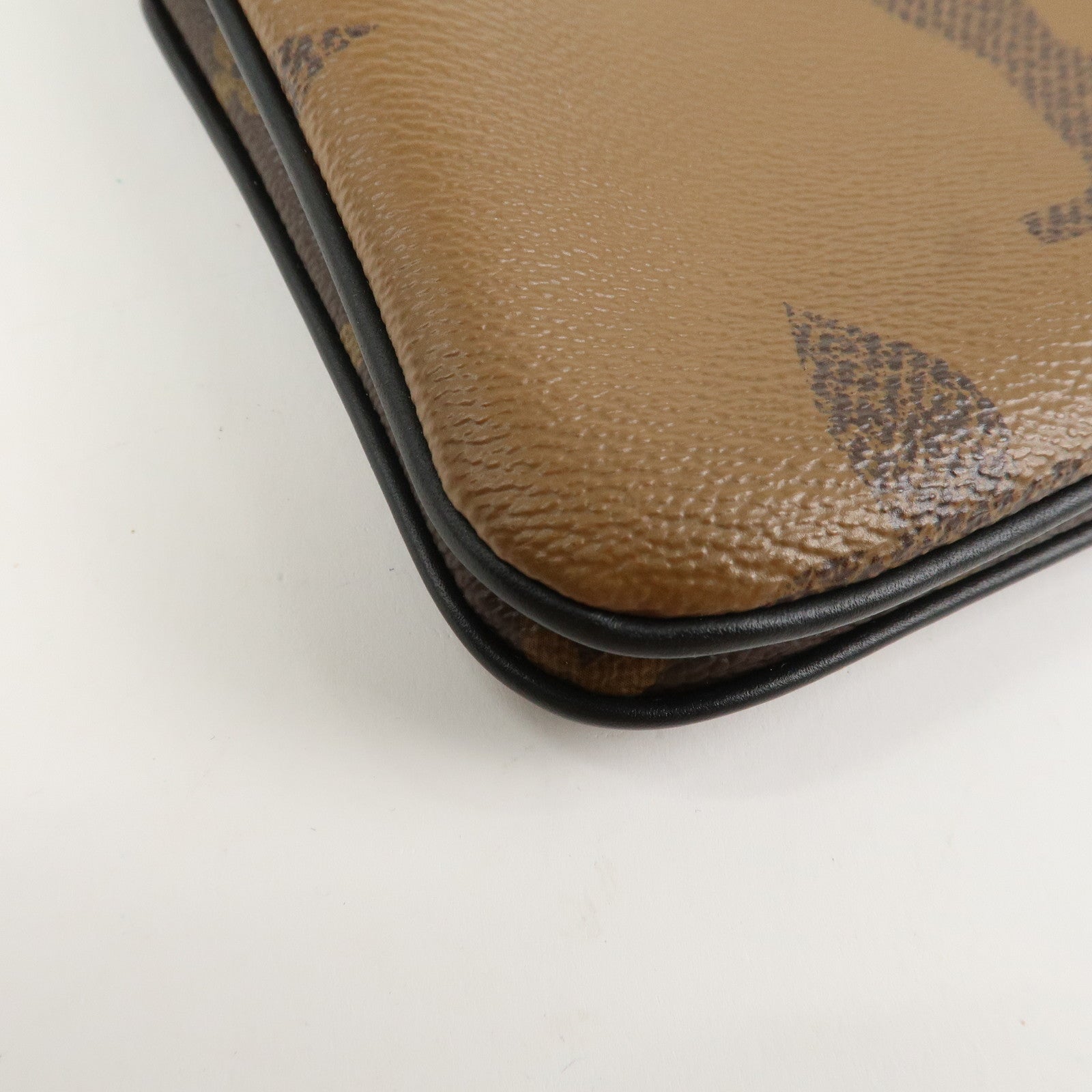 Louis Vuitton Monogram Reverse Pochette Double Zip Bag M69203