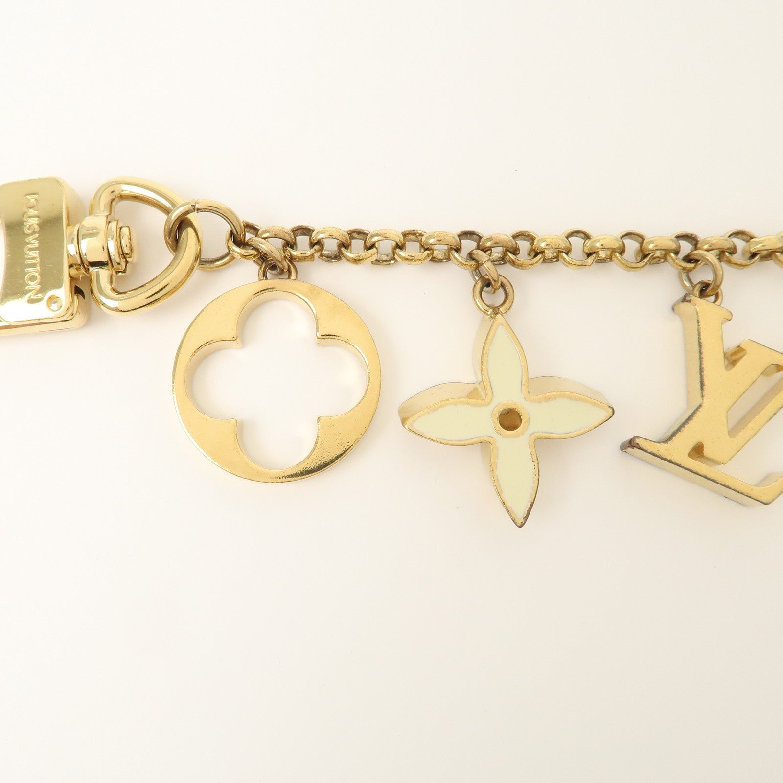 Louis Vuitton Fleur de Monogram Bag Charm Key Chain Gold M65111