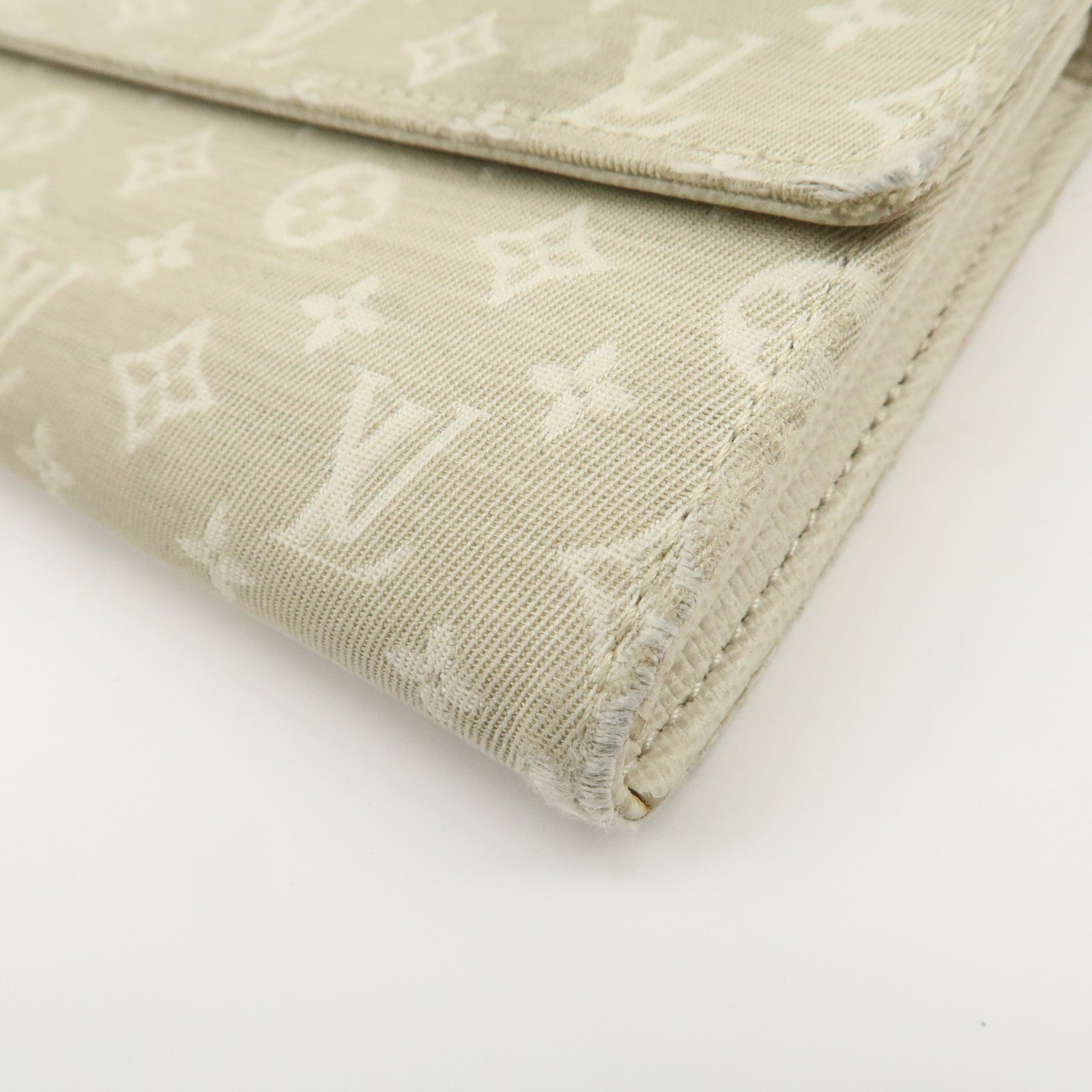 Louis Vuitton Monogram Mini Lin Portefeuille Sarah Wallet M95311