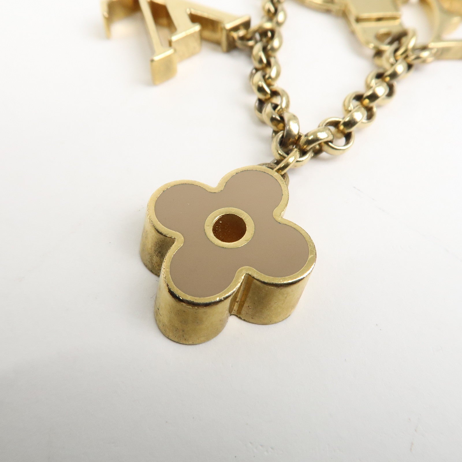 Louis Vuitton Fleur de Monogram Bag Charm Key Chain Gold M65111 Used