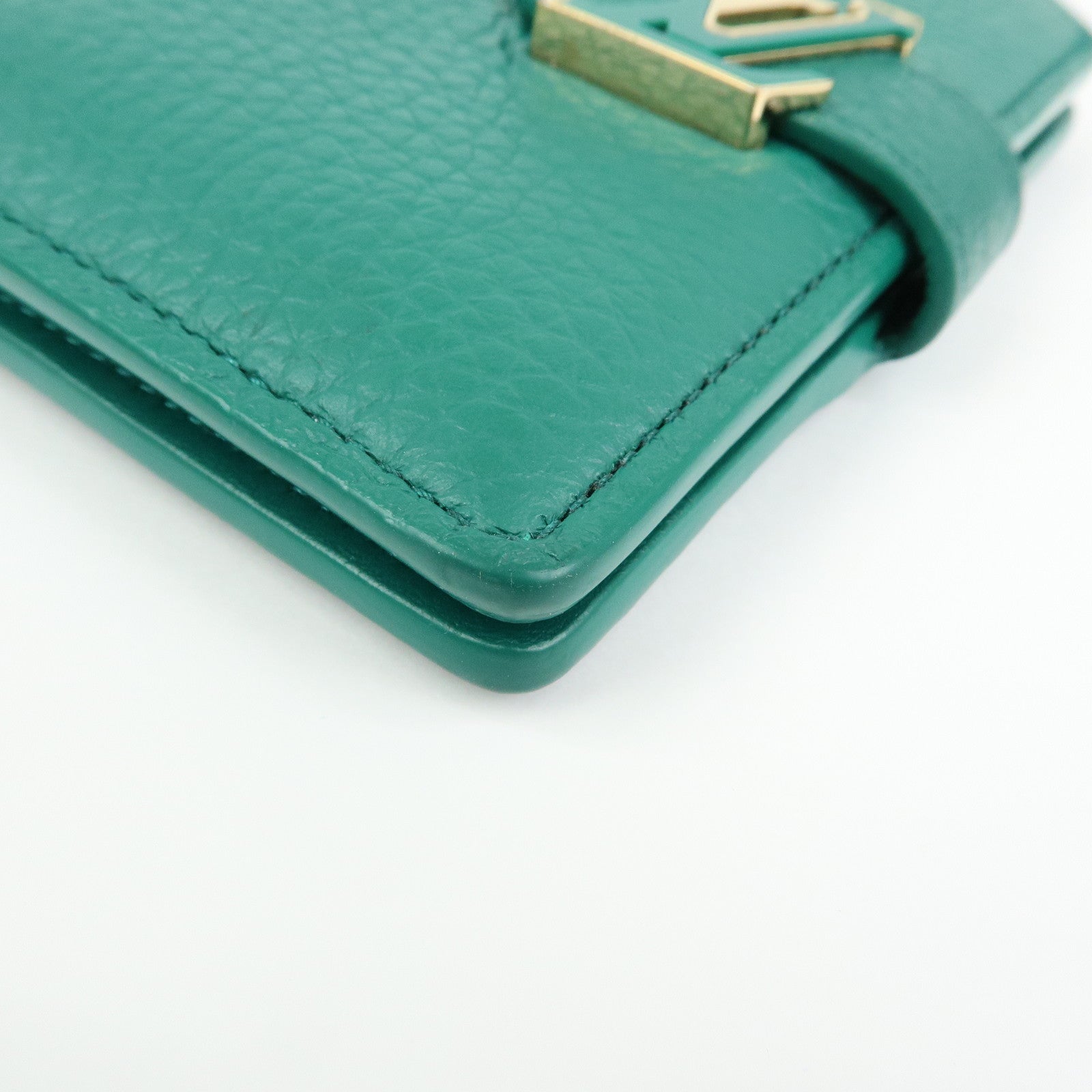 Louis Vuitton Taurillon Leather Vertical Compact Wallet M82438