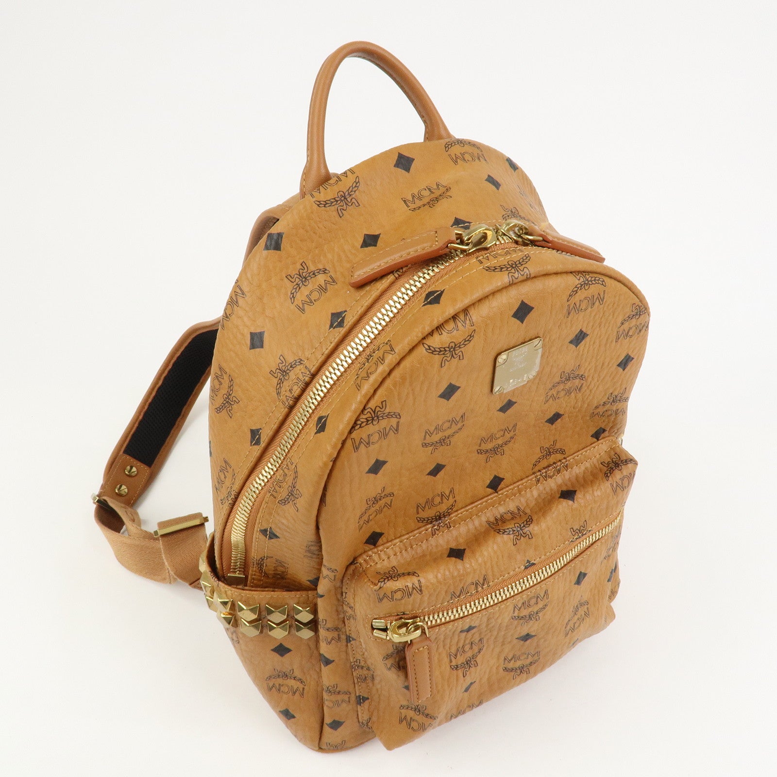 MCM Visetos PVC Leather Backpack Rucksack Studs Cognac